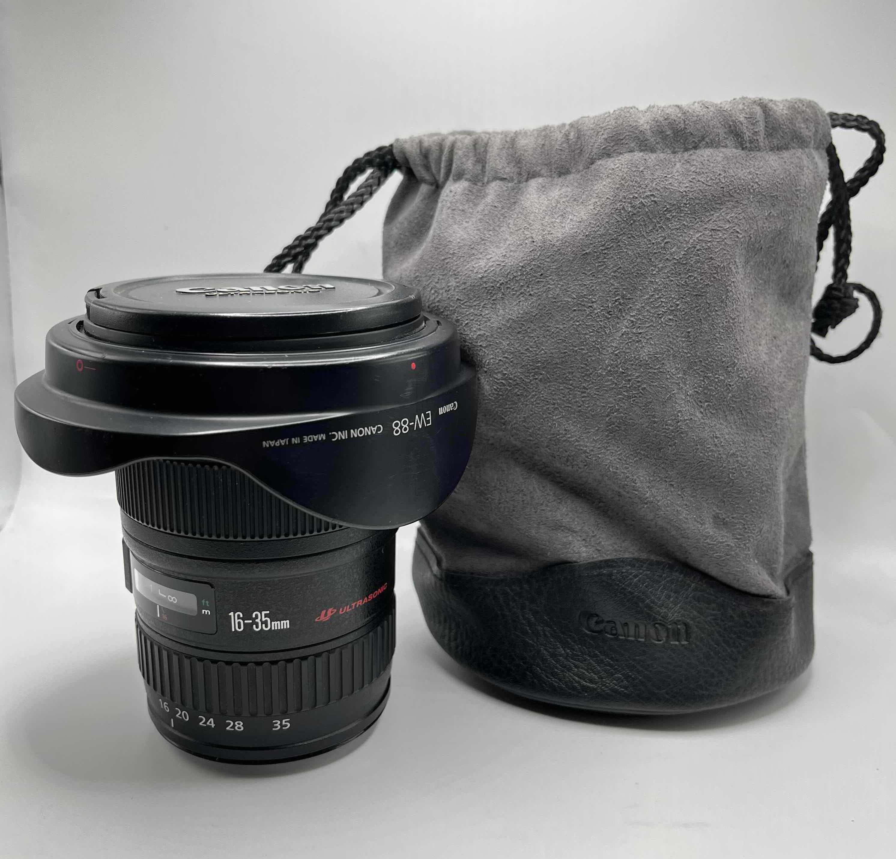 Photo 1 of CANON ULTRASONIC 16-35MM 1:2.8 L AF/MF EF LENS W EW-88 HOOD & CANON SOFT CASE