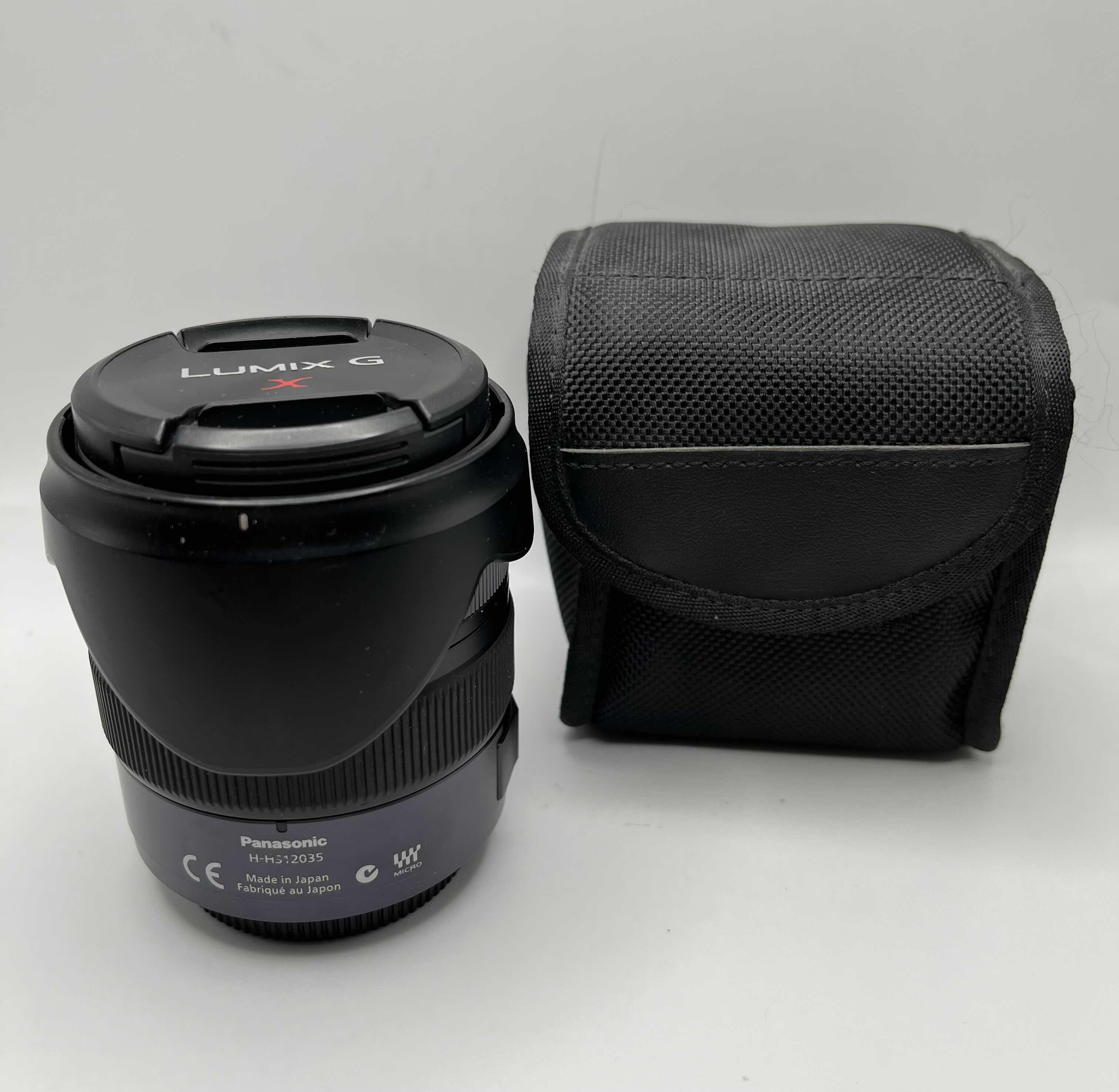 Photo 1 of PANASONIC LUMIX G SERIES VARIO 1:2.8 12/35 ASPH 0.25MM/0.82FT POWER O.I.S LENS H-HS12035 W SOFT CASE