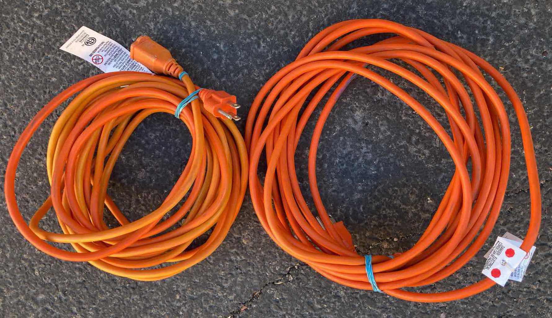 Photo 1 of ORANGE EXTENSION CORDS (2)