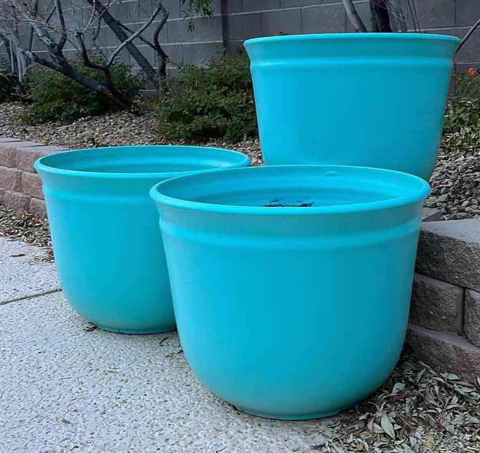 Photo 2 of OUTDOOR PAINTED TEAL PLASTIC PLANTERS (3) 22” X 16.5”