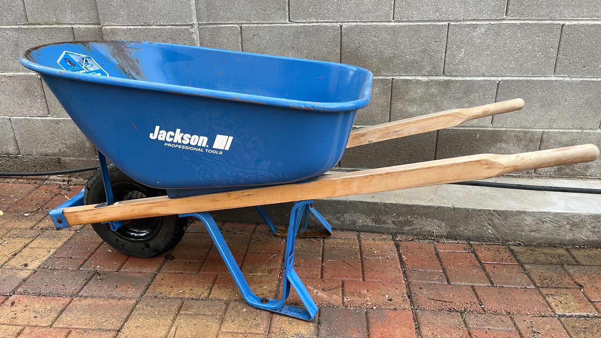 Photo 4 of JACKSON PROFESSIONAL TOOLS BLUE STEEL NEVER FLAT TIRE WHEELBARROW 25” X 60” H28”