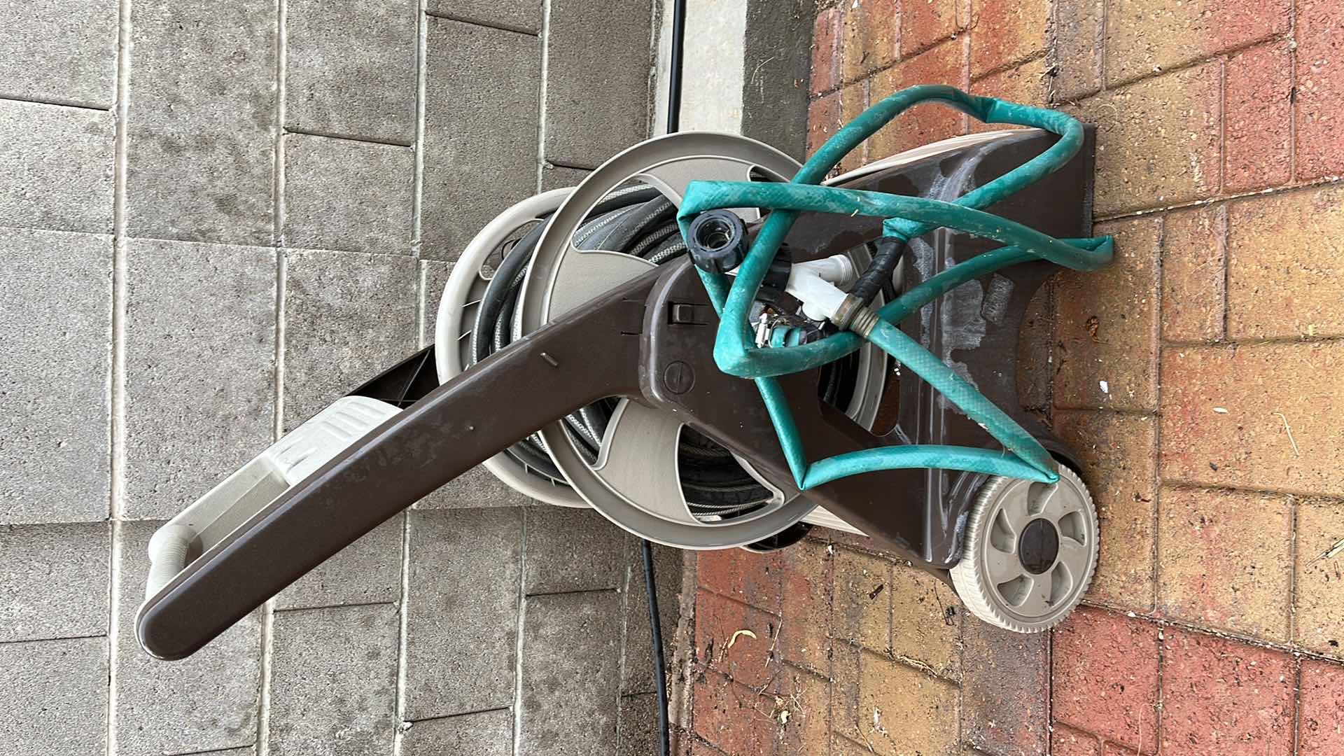 Photo 5 of AMES GARDEN HOSE REEL W HOSE NOZZLE ATTACHMENTS (4)