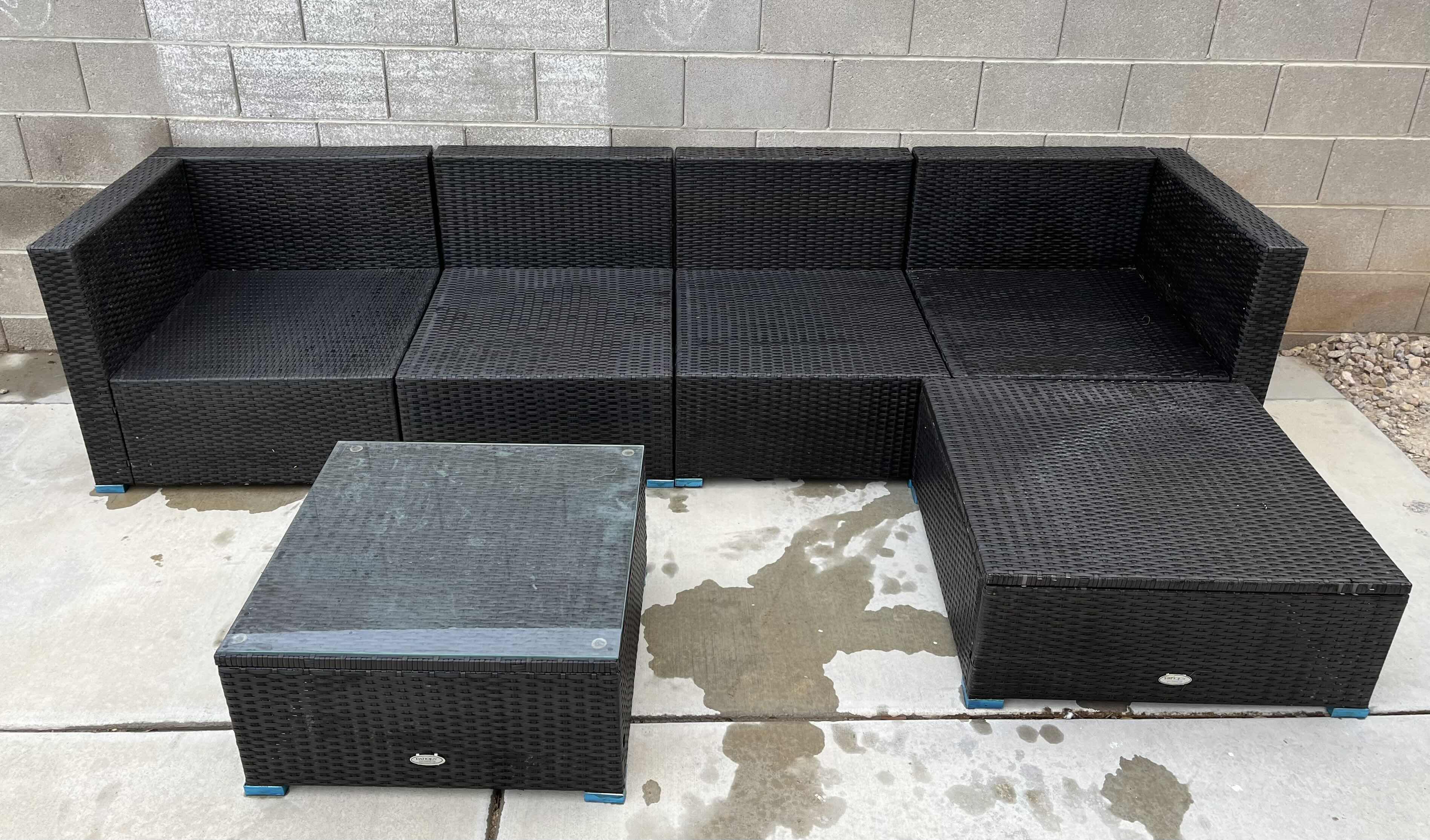 Photo 2 of PATIOJOY WOVEN AGED BRONZE FINISH PATIO 4PC SOFA 112” X 29.5” H25.5” W OTTOMAN & GLASS TOP TABLE