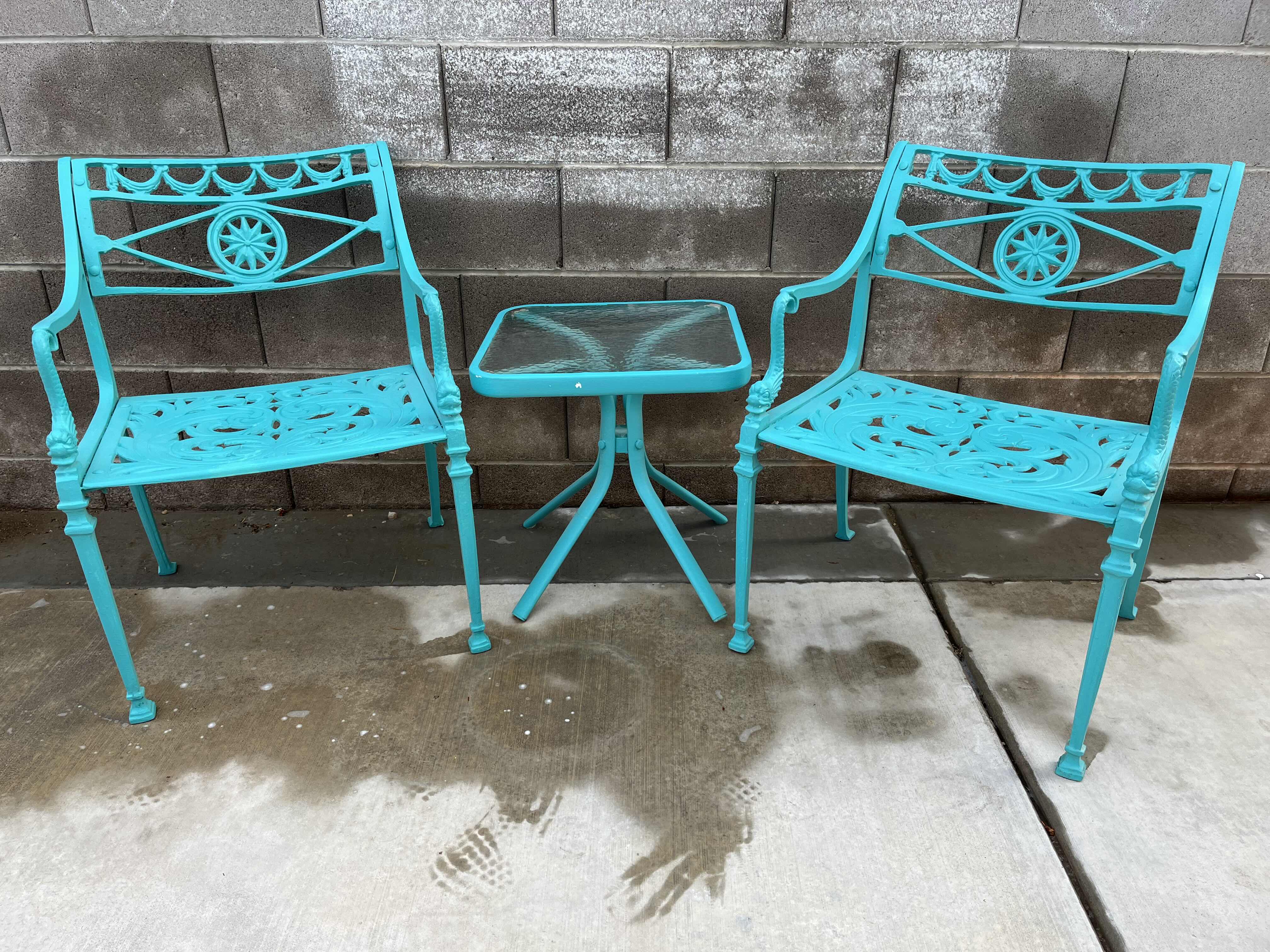 Photo 1 of WROUGHT IRON PATIO CHAIRS (2) 22” X 22” H30” W GLASS TOP SIDE TABLE 18” X 18” H18.75”