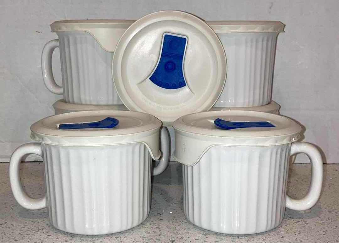 Photo 1 of CORNINGWARE FRENCH WHITE STONEWARE POP-IN 20OZ CUPS W VENTED PLASTIC COVERS (SET OF 6)