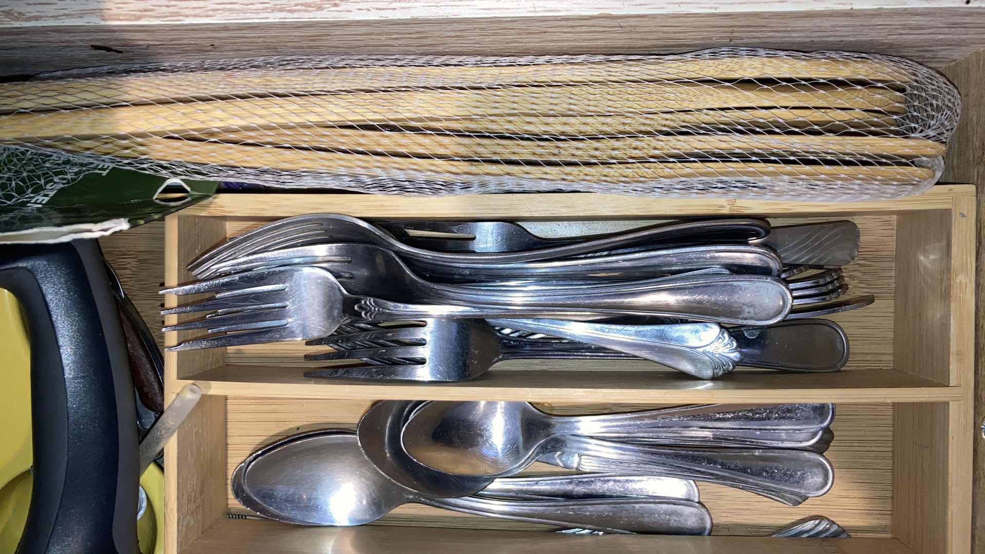 Photo 2 of CONTENTS OF DRAWER- FLATWARE, WOODEN SPOONS & TRAY