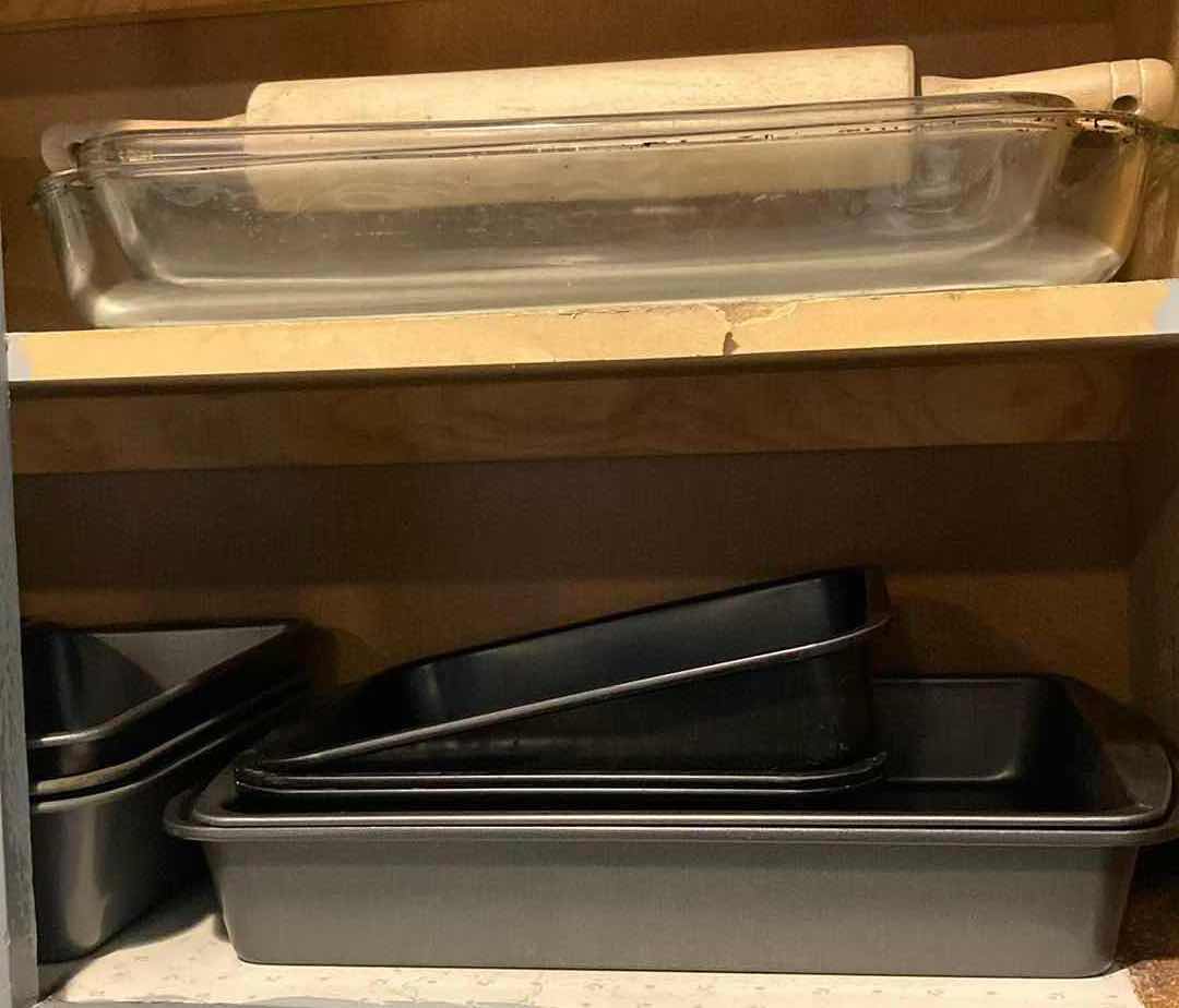 Photo 3 of CONTENTS OF CABINET- STEEL & GLASS BAKING PANS VARIOUS SIZES W ROLLING PIN & HAND MIXER