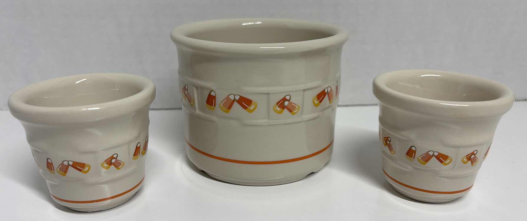 Photo 1 of LONGABERGER POTTERY WOVEN TRADITIONS HEIRLOOM CANDY CORN 1 PINT SALT CROCK 4.25” X 3.5” & PAIR OF CANDY CORN VOTIVE HOLDERS 2.75” X 2.5”