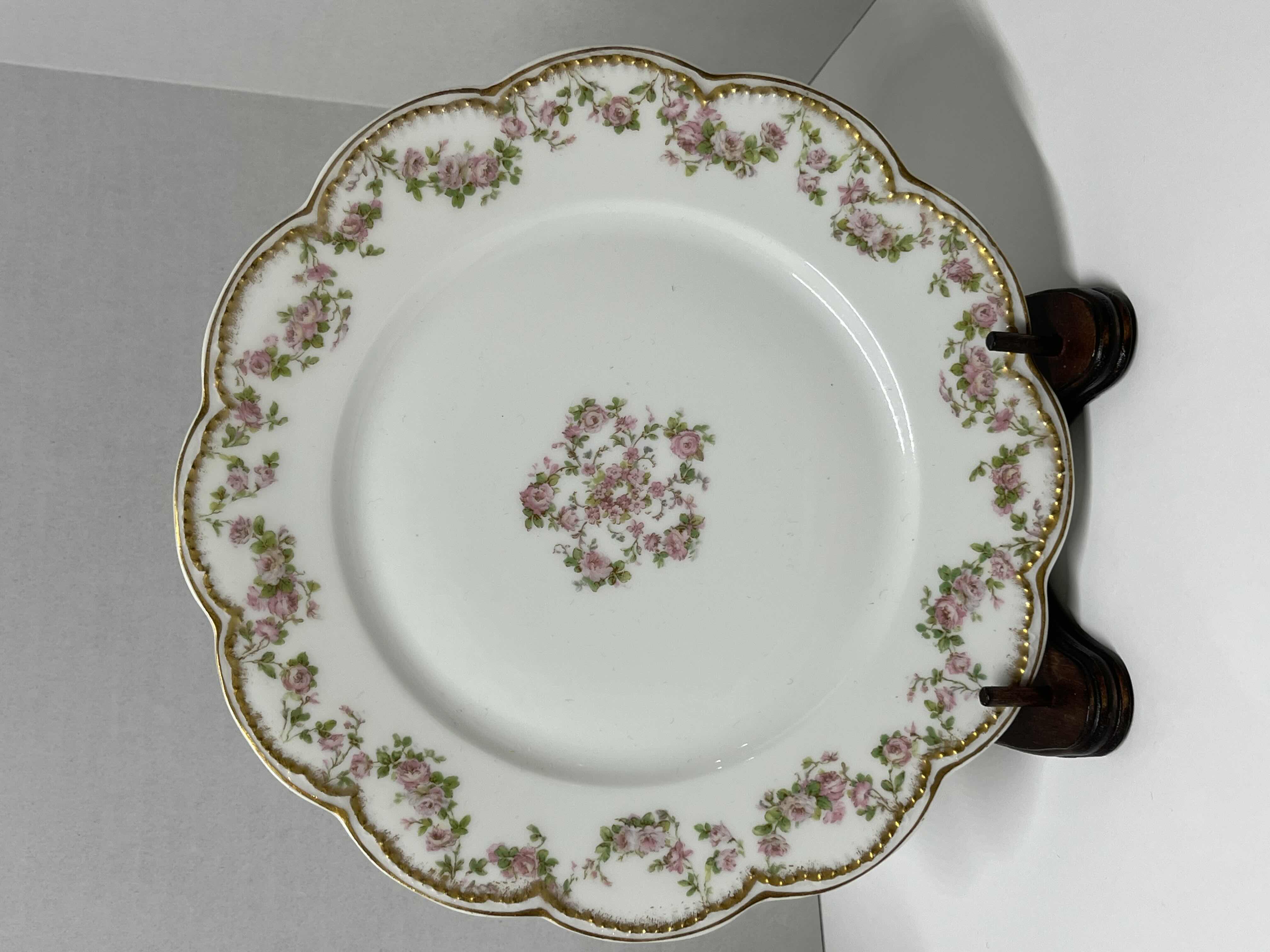 Photo 4 of ANTIQUE THEODORE HAVILAND LIMOGES FRANCE PINK, GREEN & GOLD EMBOSSED FLORAL DESIGN FINE CHINA PLATE SET (3) W WOOD DISPLAY STANDS (3)