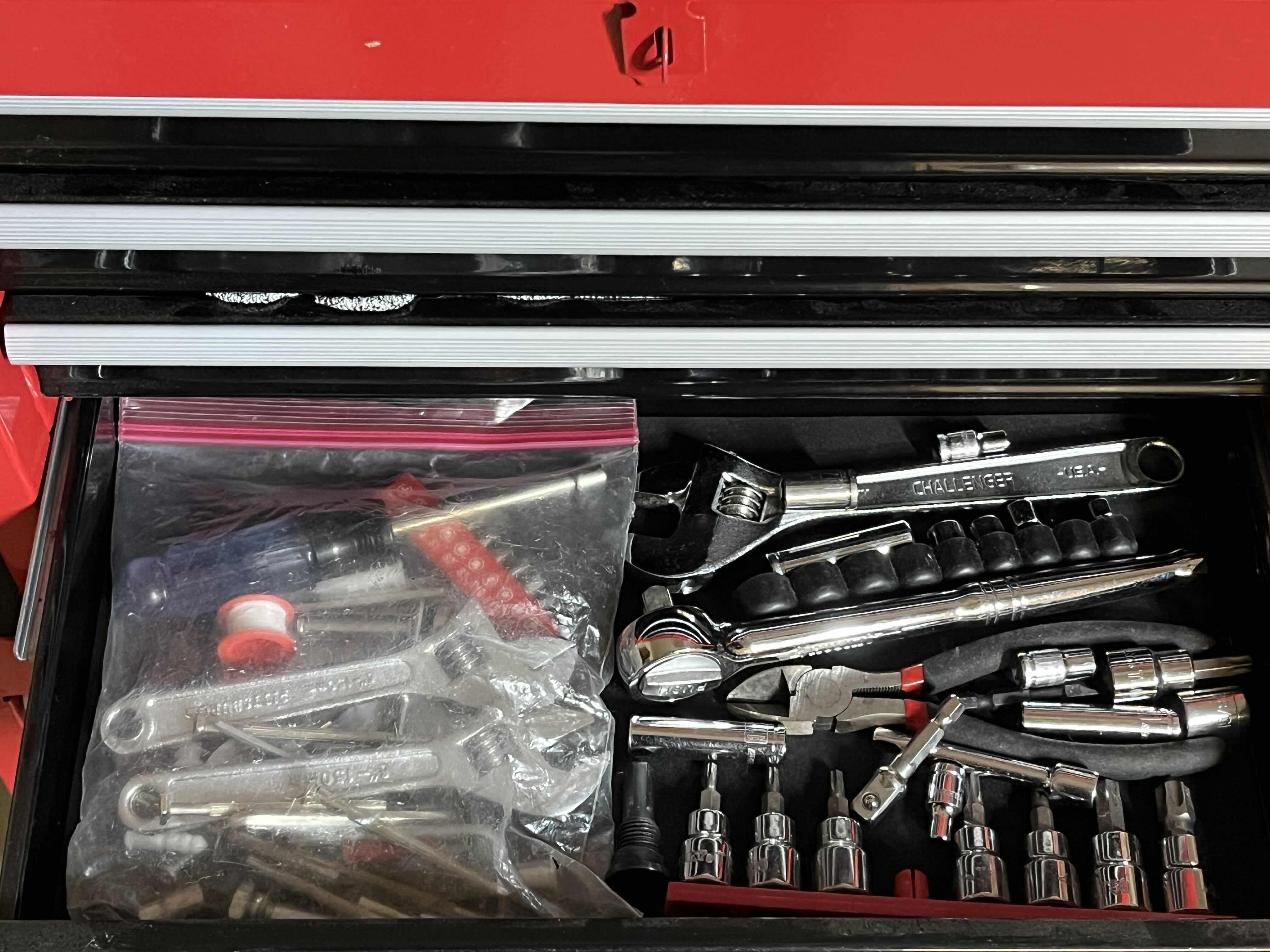 Photo 1 of RED & BLACK 5 DRAWER ROLLING METAL TOOL CHEST W VARIOUS TOOLS & HARDWARE 23” X 11” H40”