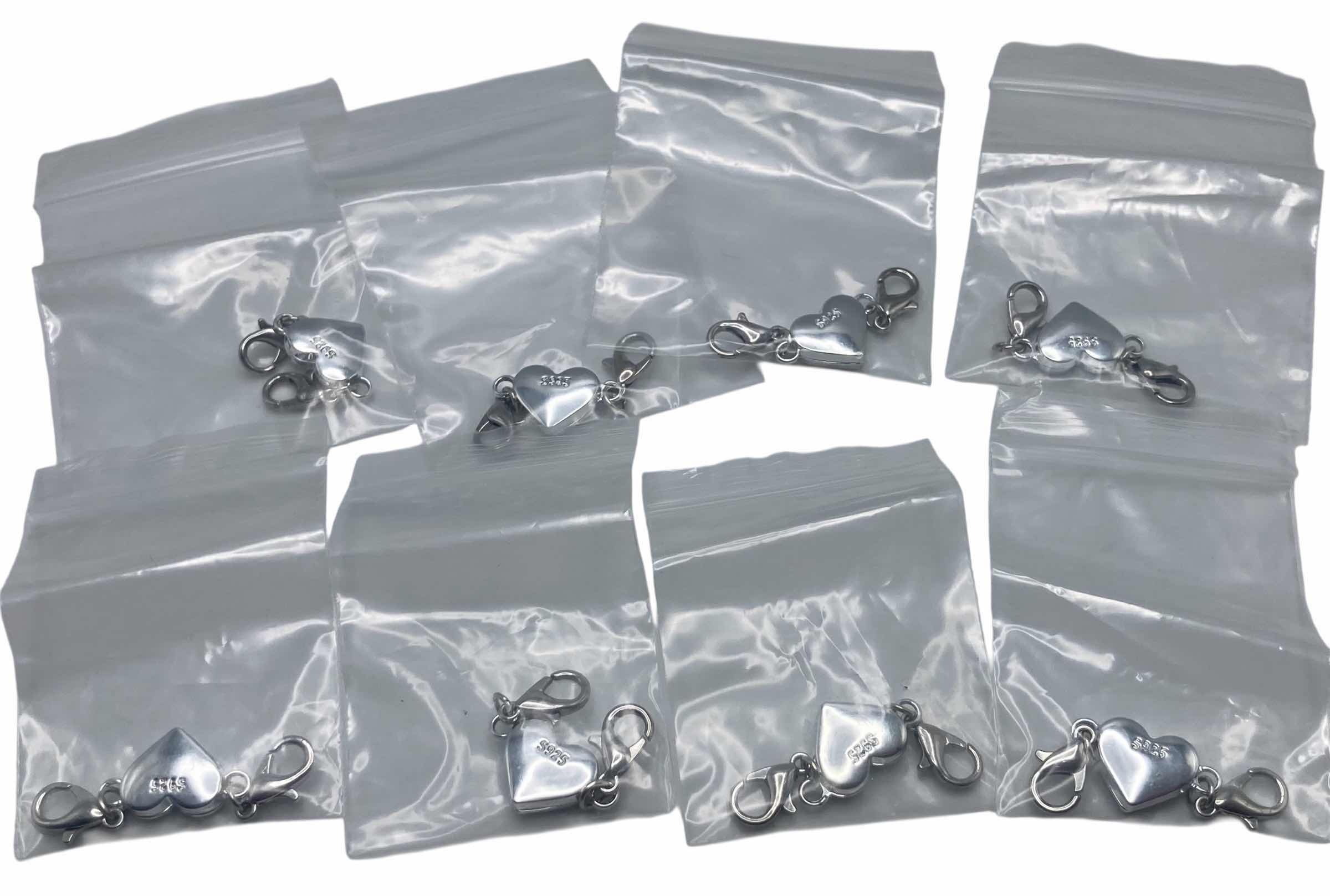 Photo 1 of HEART STERLING SILVER BRACELET PENDANTS (8) .375” 29.8G (READ NOTES) $40