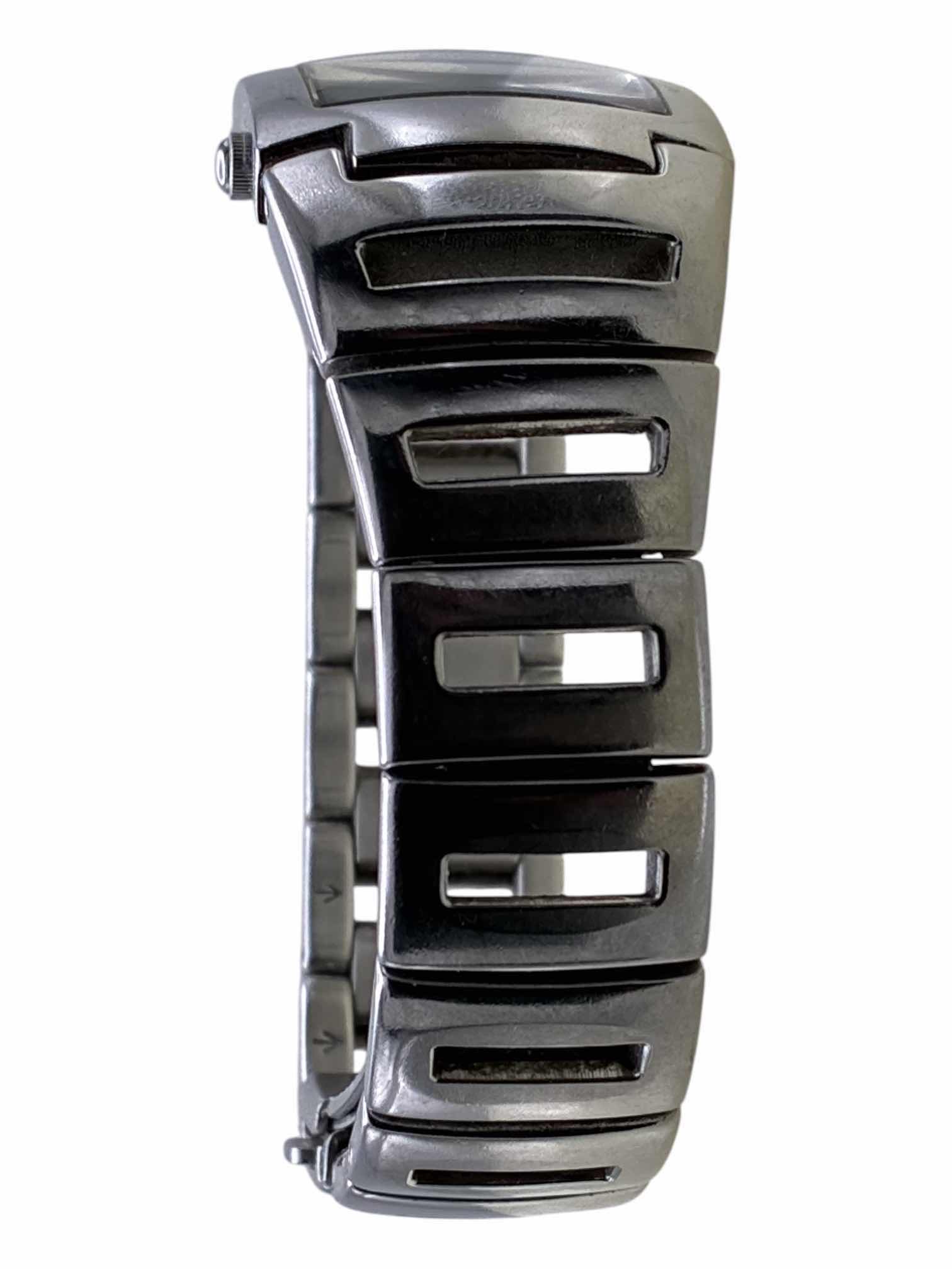 Photo 1 of KENNETH COLE STAINLESS STEEL LADIES WATCH 2.30” DIA $40