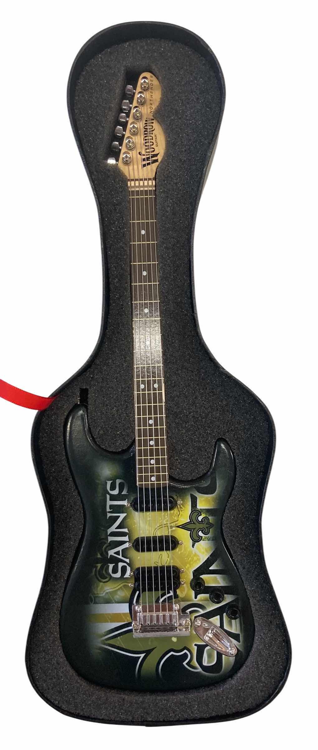 View 1 of WOODROW NORTHLANDER MINI GUITAR LIMITED EDITION NEW ORLEANS SAINTS H10” $70
