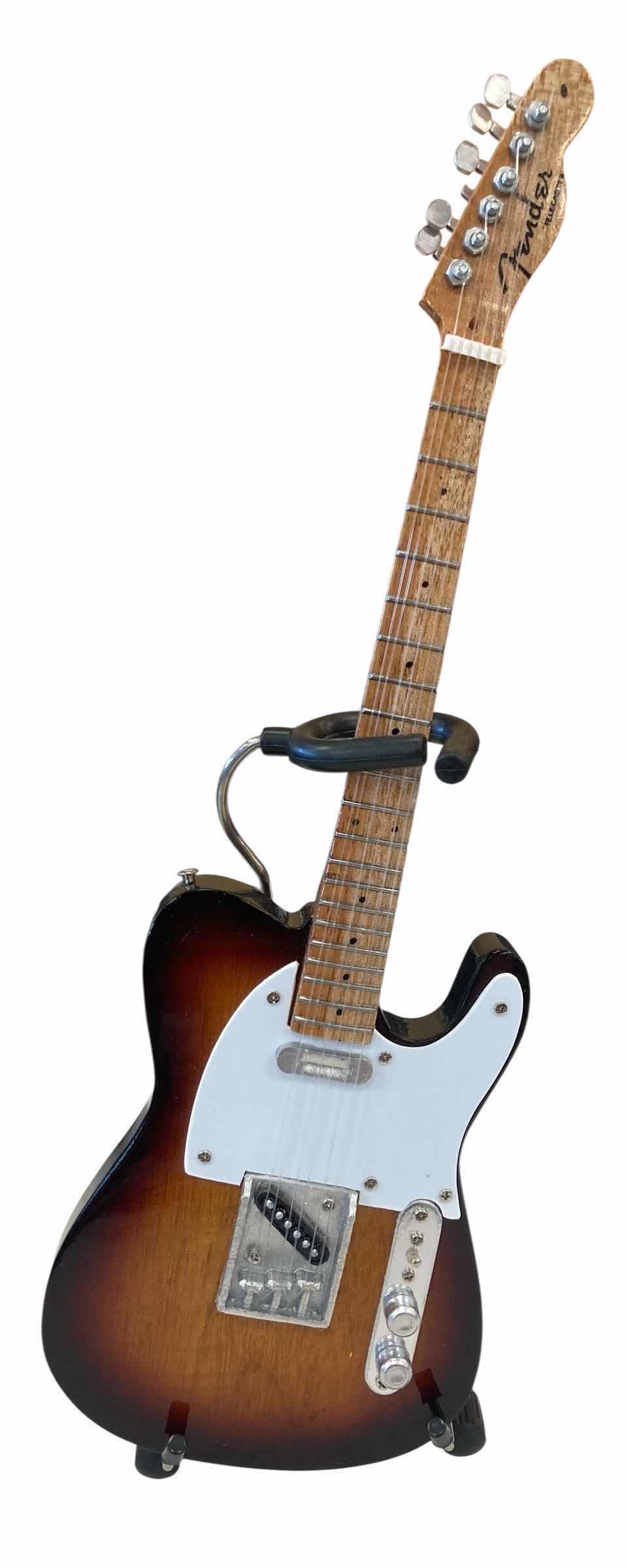 Photo 1 of NEW FENDER BY AXE HEAVEN MINIATURE GUITARS TELECASTER CLASSIC SUNBURST ELECTRIC GUITAR W STAND H9.5” $40