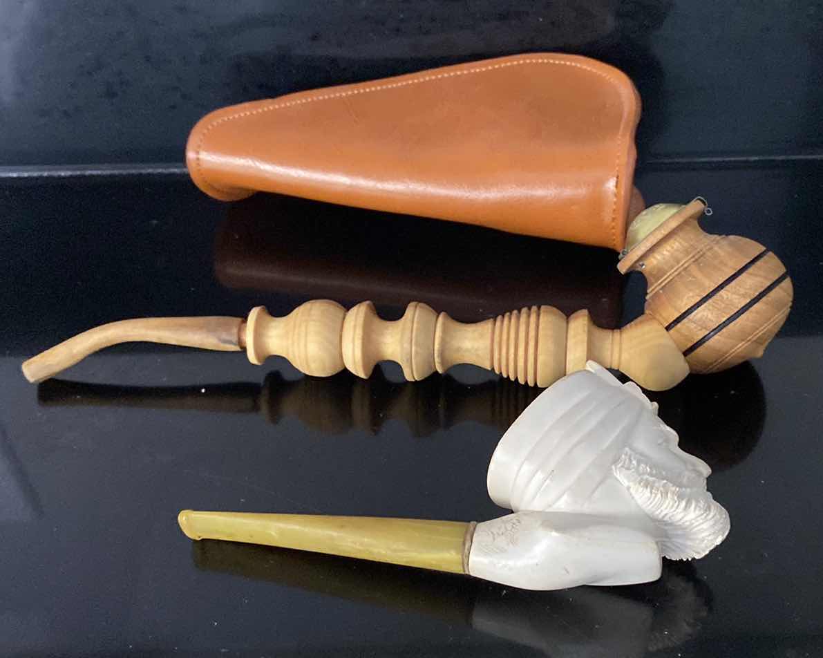 Photo 1 of 2- RARE CARVED SMOKING PIPES W. LEATHER CASE