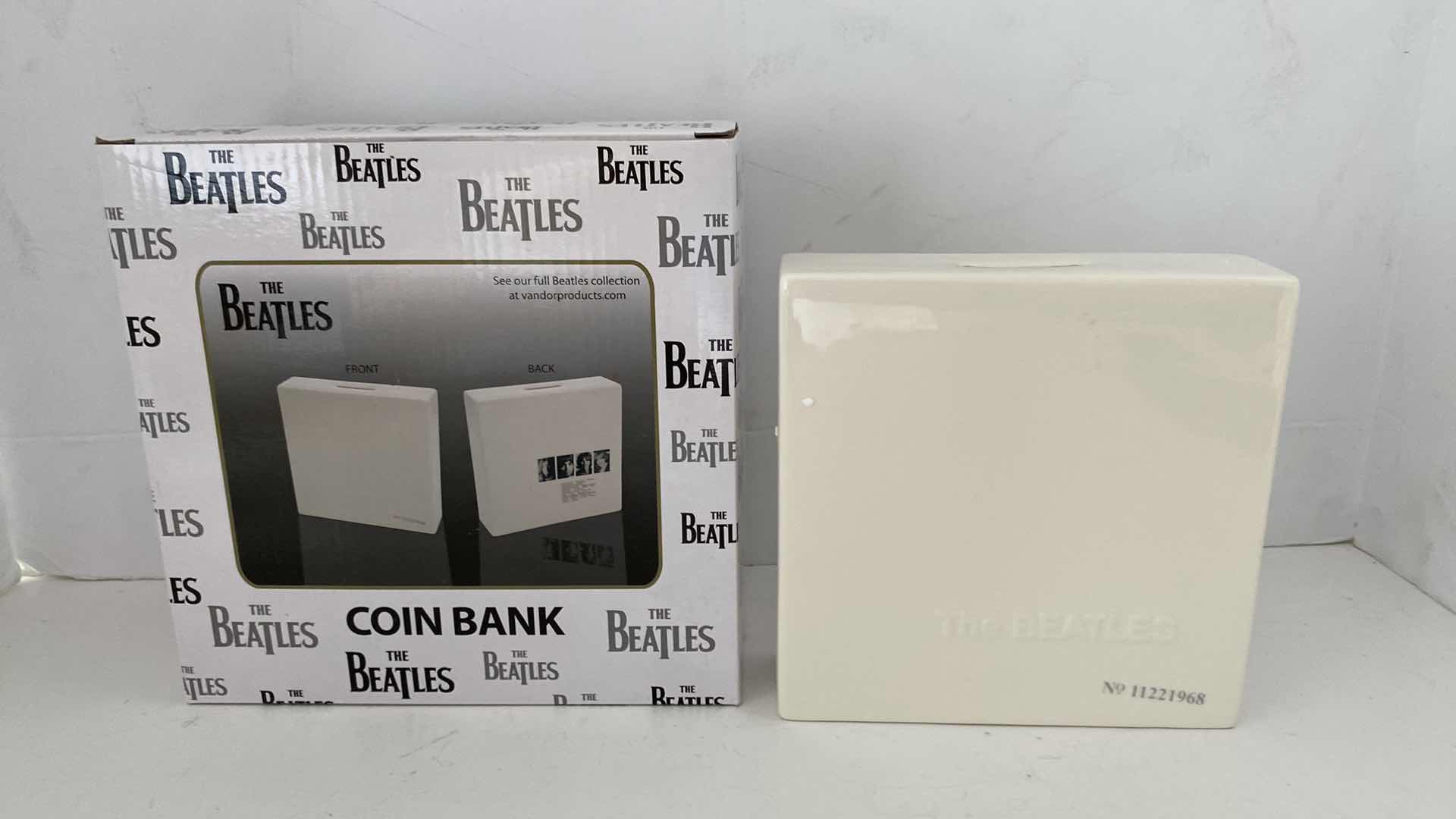 Photo 3 of BEATLES NUMBERED LIMITED EDITION BANK AND MUNIATURE ALBUM COLLECTION