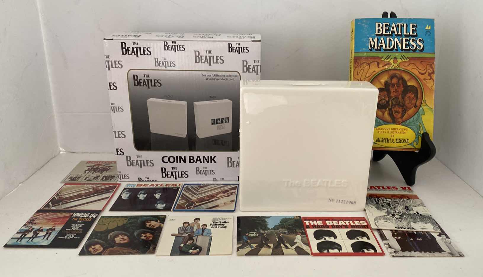 Photo 1 of BEATLES NUMBERED LIMITED EDITION BANK AND MUNIATURE ALBUM COLLECTION