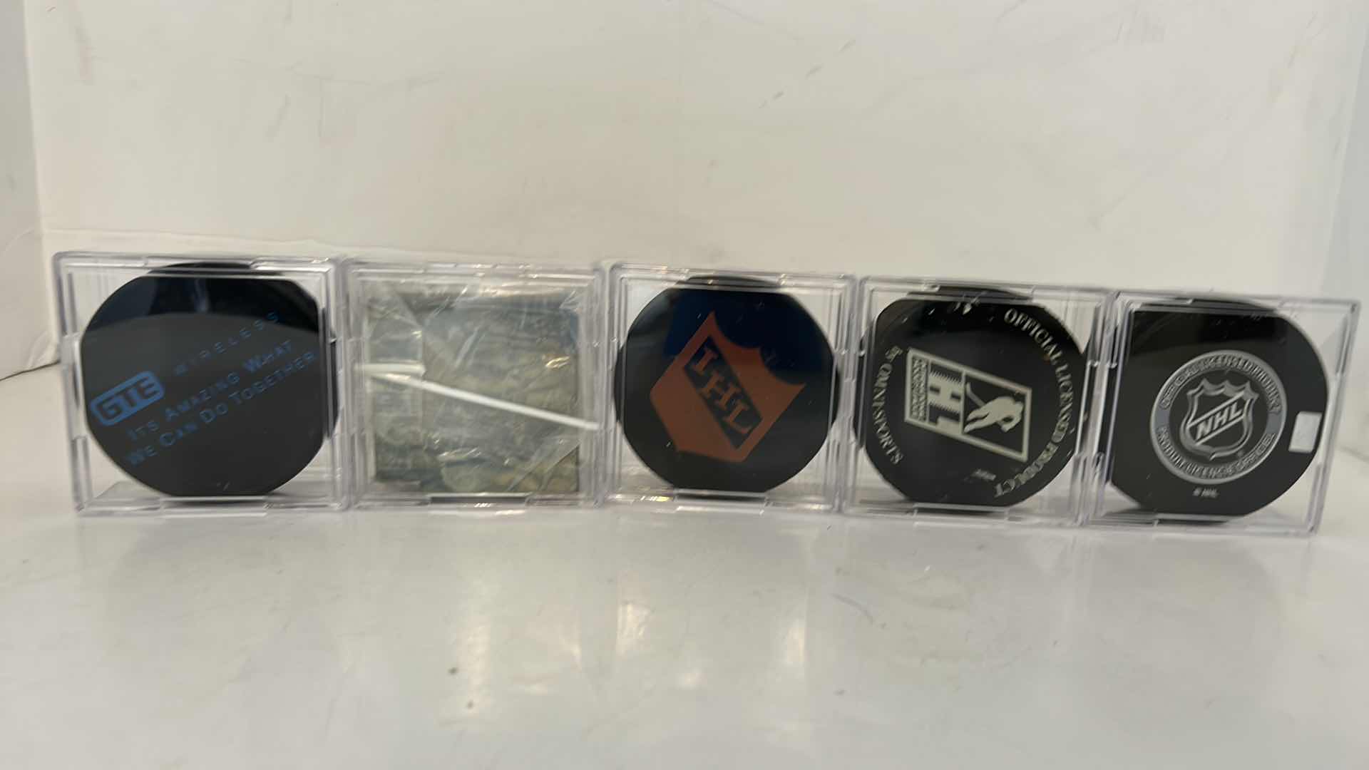 Photo 4 of 5 HOCKEY PUCKS