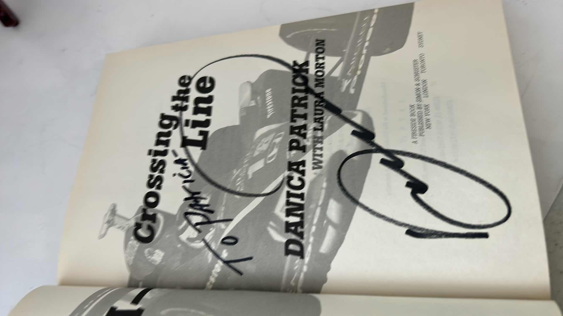 Photo 2 of AUTOGRAPHED HARDCOVER- “ DANIKA CROSSING THE LINE, DANIKA PATRICK” wWITH LAURA MORTON