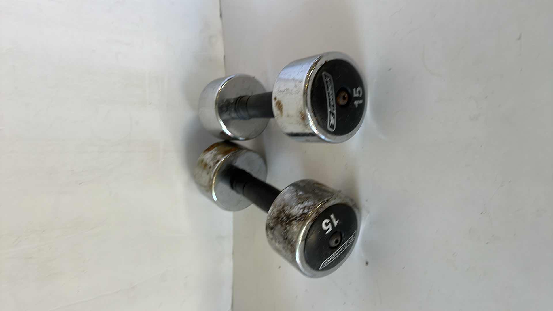 Photo 2 of TWO 15LB DUMBBELLS