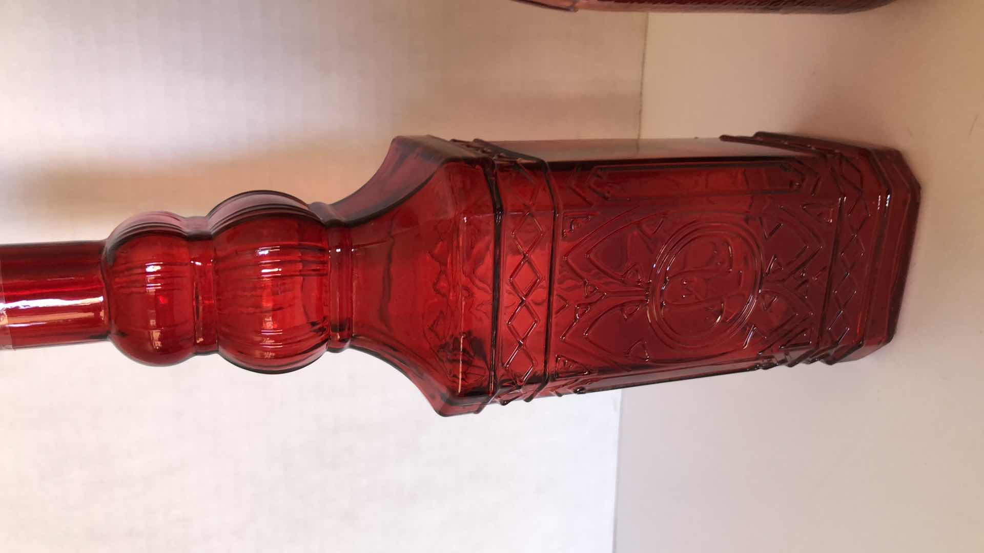 Photo 2 of RED GLASS BOTTLES