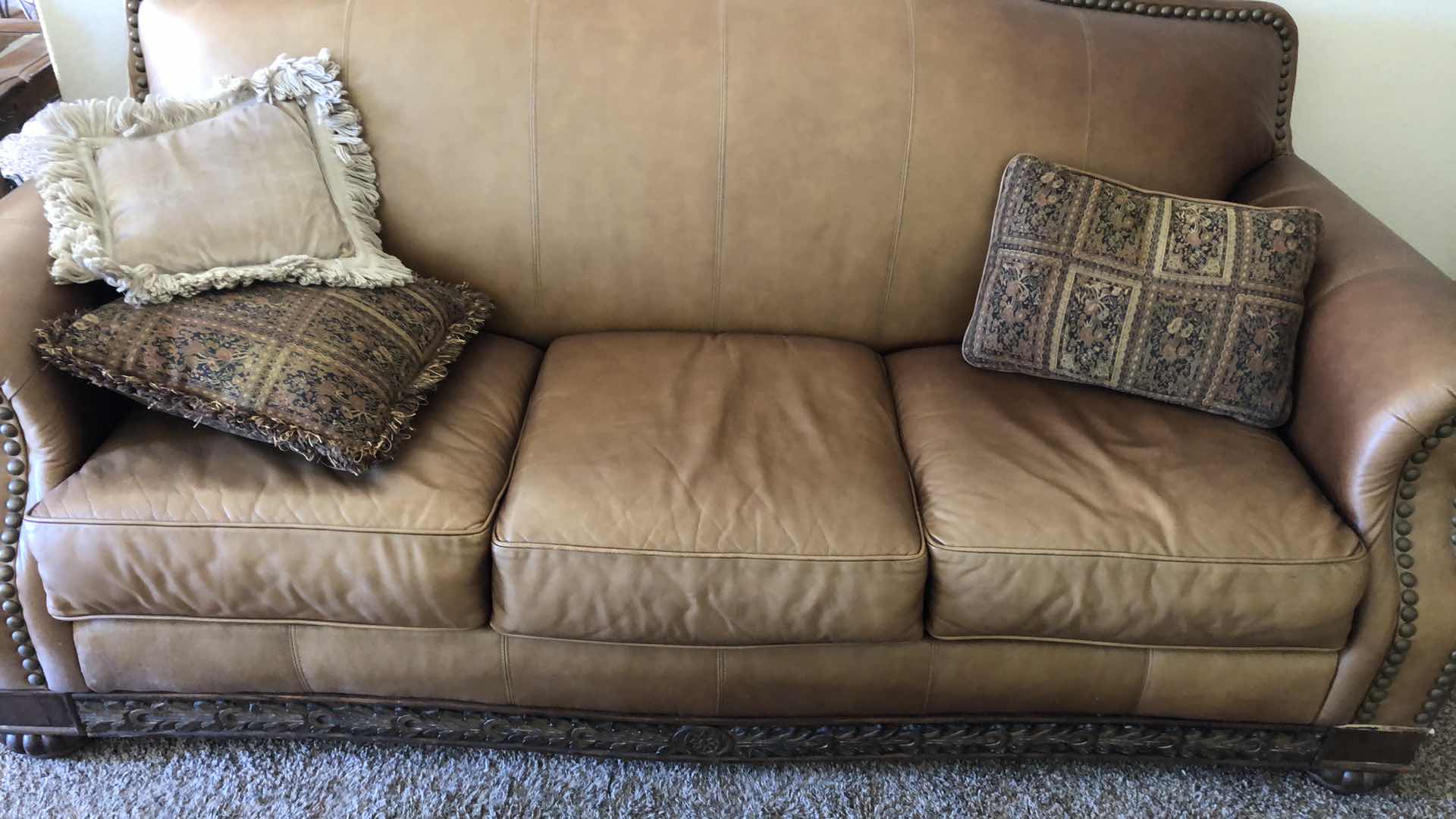 Photo 1 of BROWN LEATHER SOFA W NAIL HEAD TRIM 84” X 38” H 39”