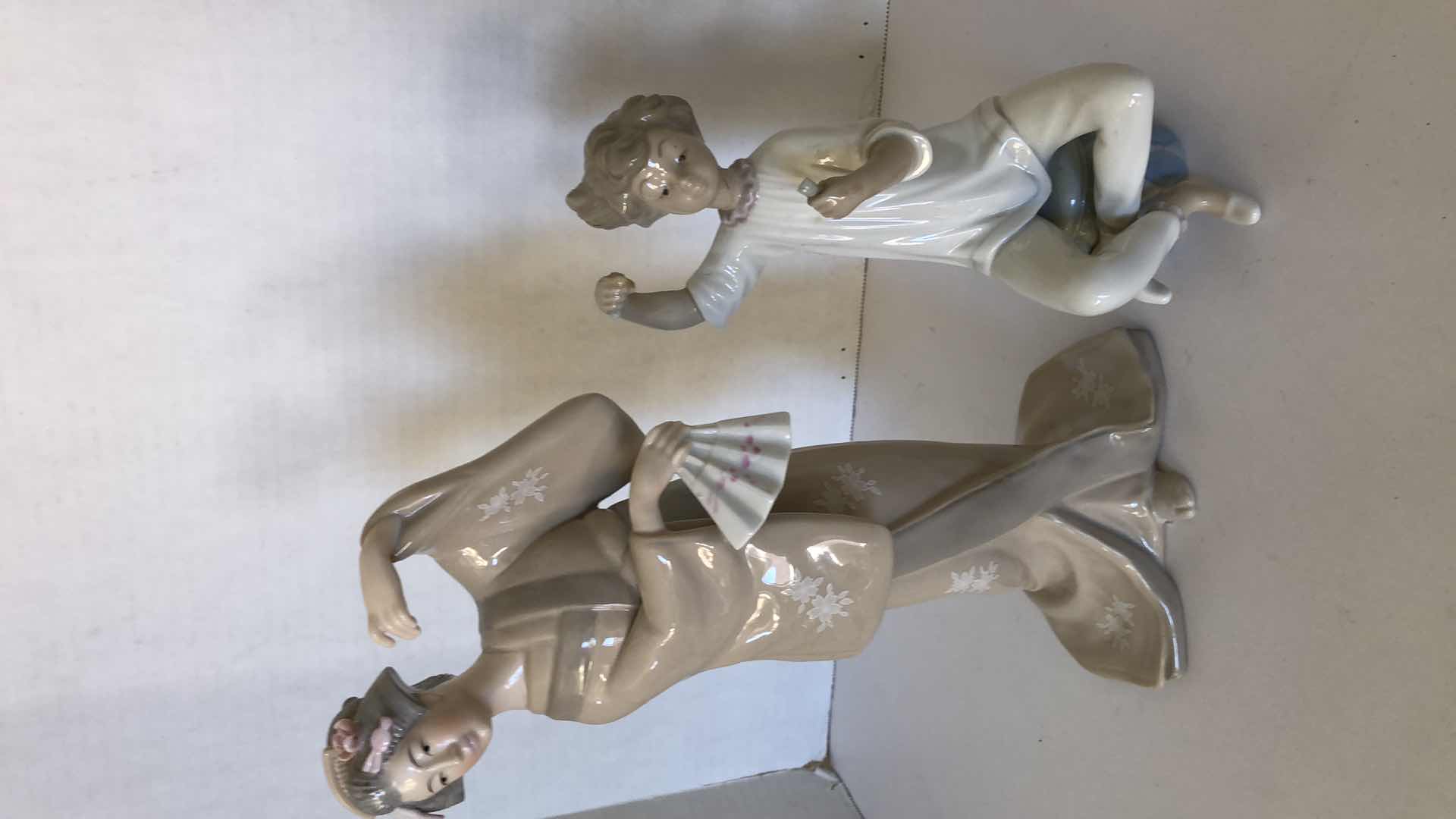 Photo 1 of 2-COLLECTIBLE PORCELAIN FIGURINES (TOYO & LLARDRO)