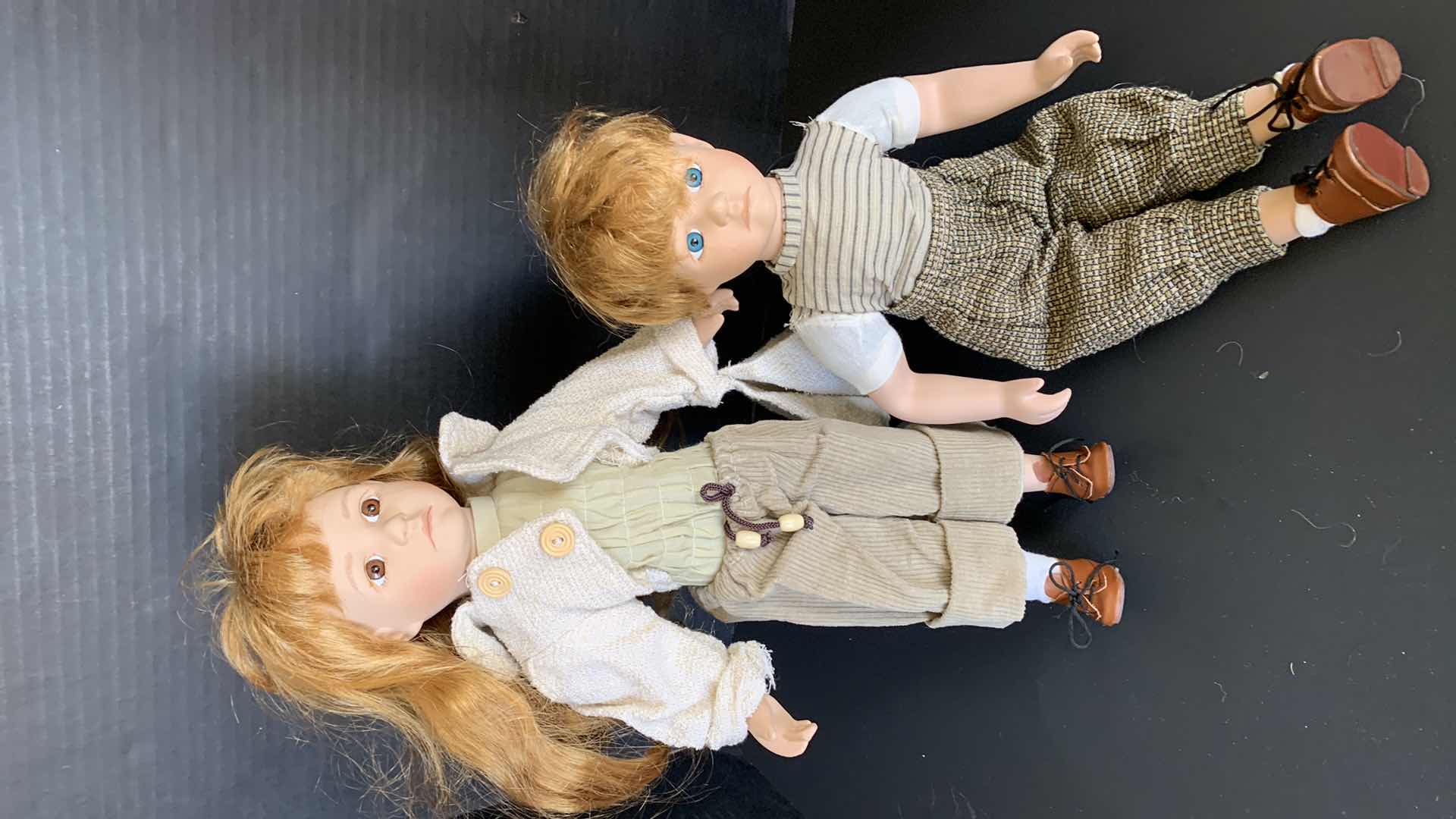 Photo 1 of BOY AND GIRL PORCELAIN DOLLS