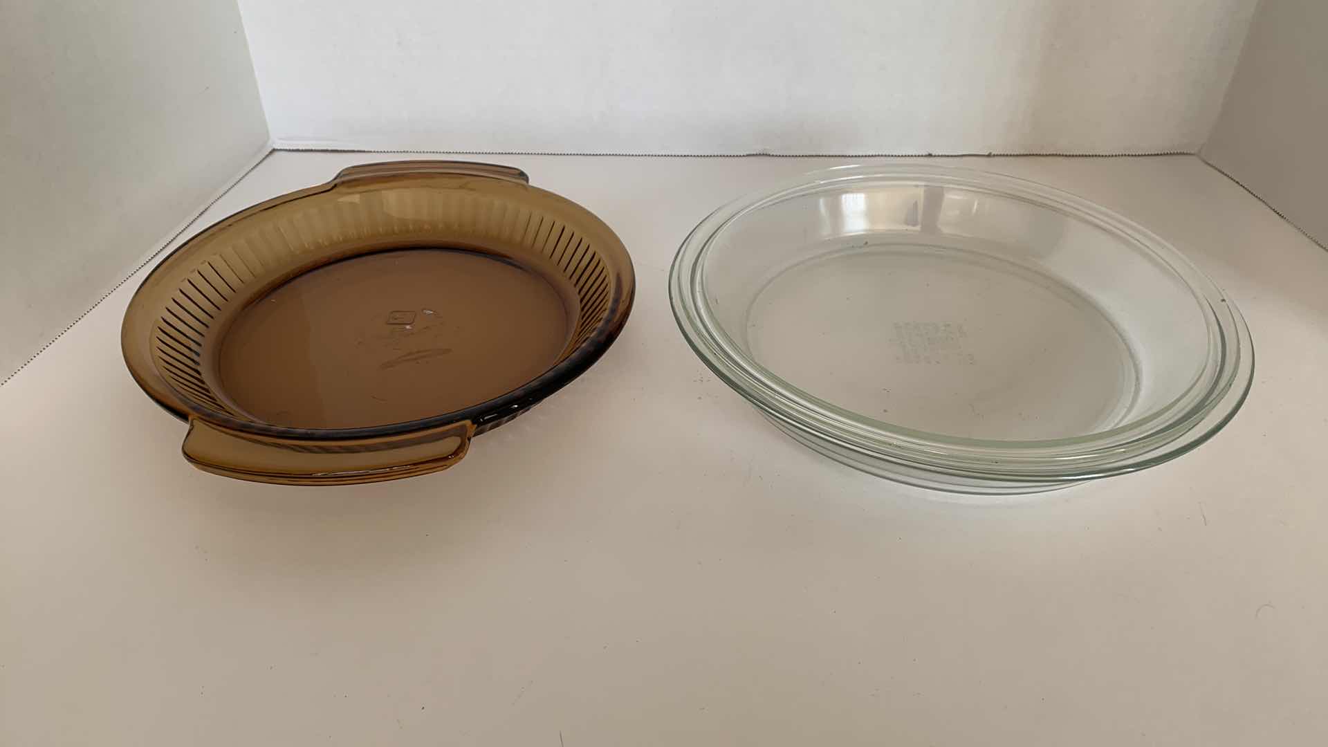 Photo 1 of 2 - 10” PIE PLATES AND 1 - 9” PIE PLATE