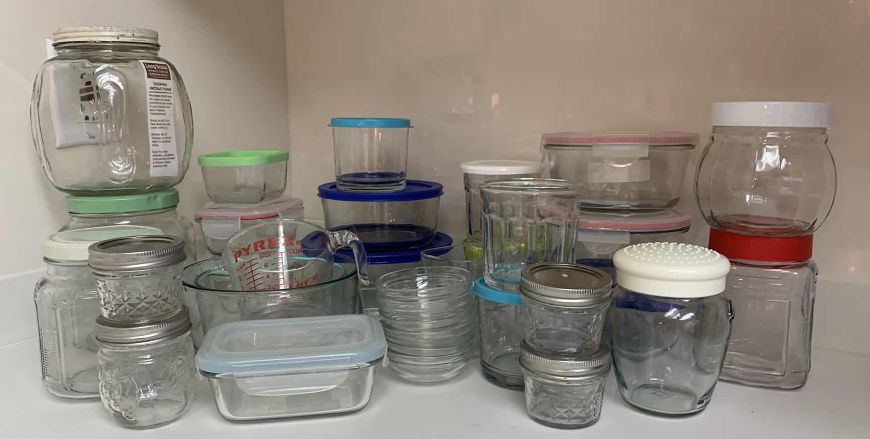 Photo 1 of ASSORTED VINTAGE GLASS JARS ,  STORAGE CONTAINERS AND MORE