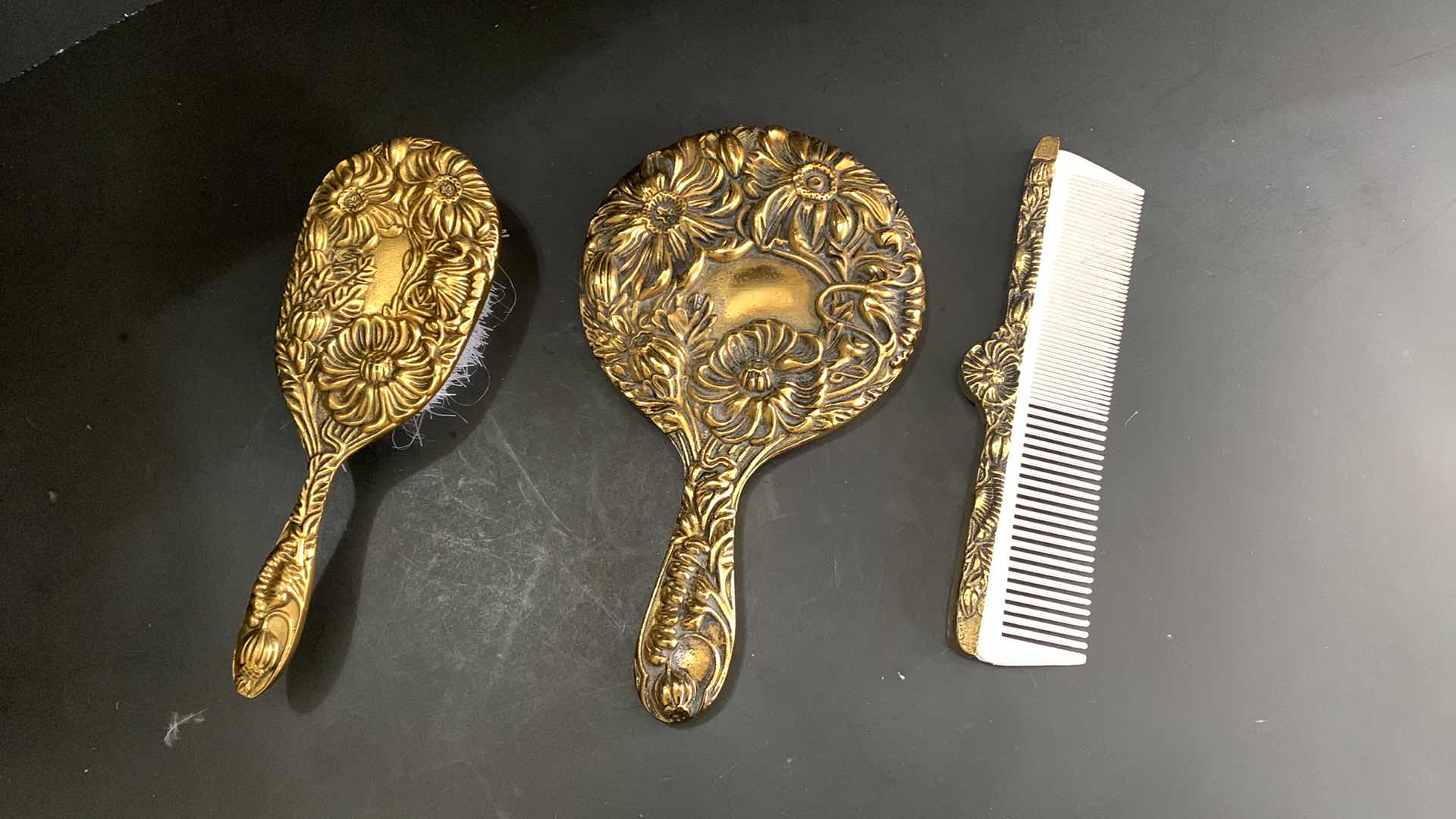 Photo 1 of ANTIQUE BRASS BRUSH COMB AND MIRROR SET. GLOW SUGAR KIT