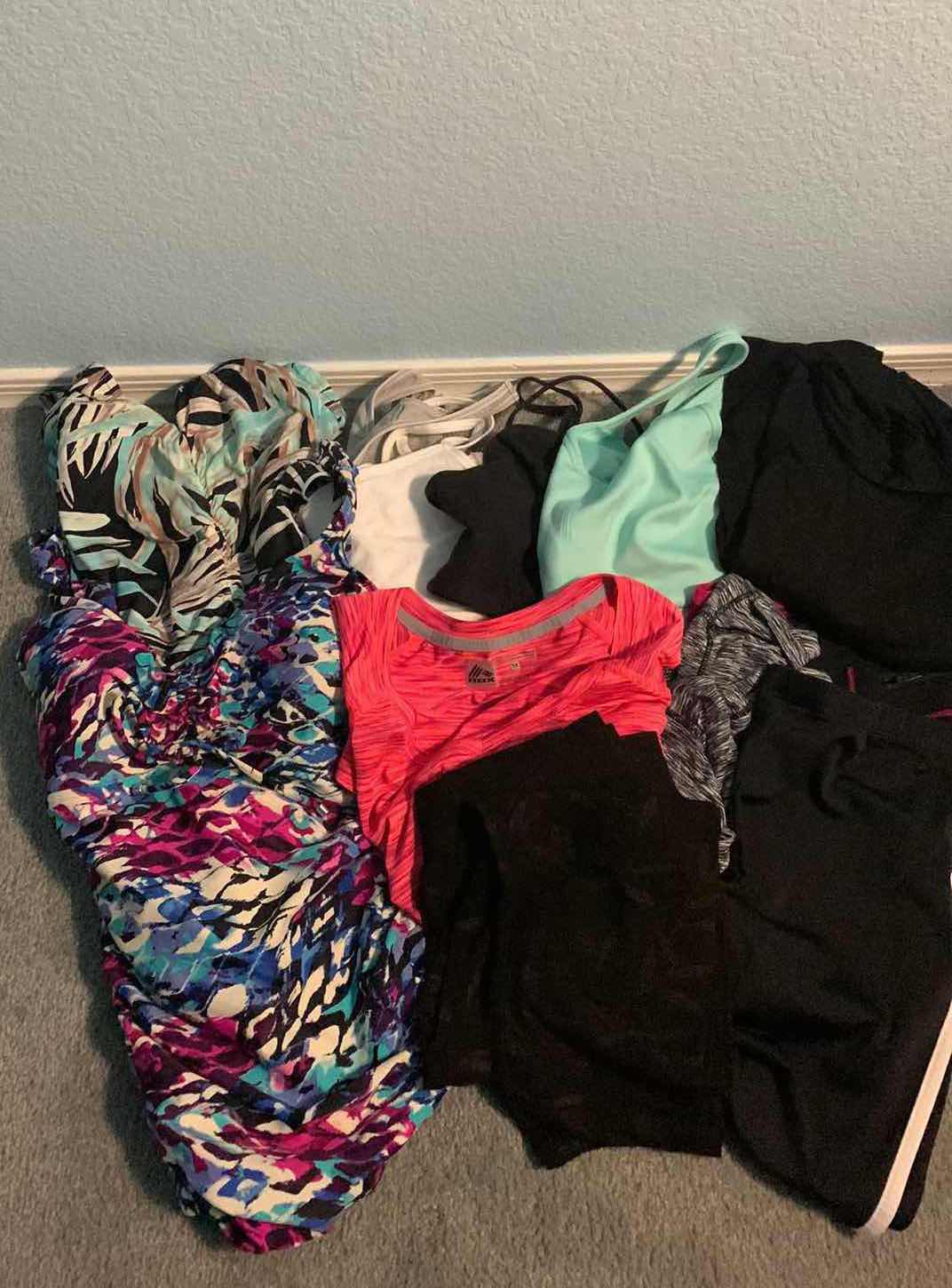 Photo 1 of WOMENS WORKOUT CLOTHES AND 2 SWIMSUITS