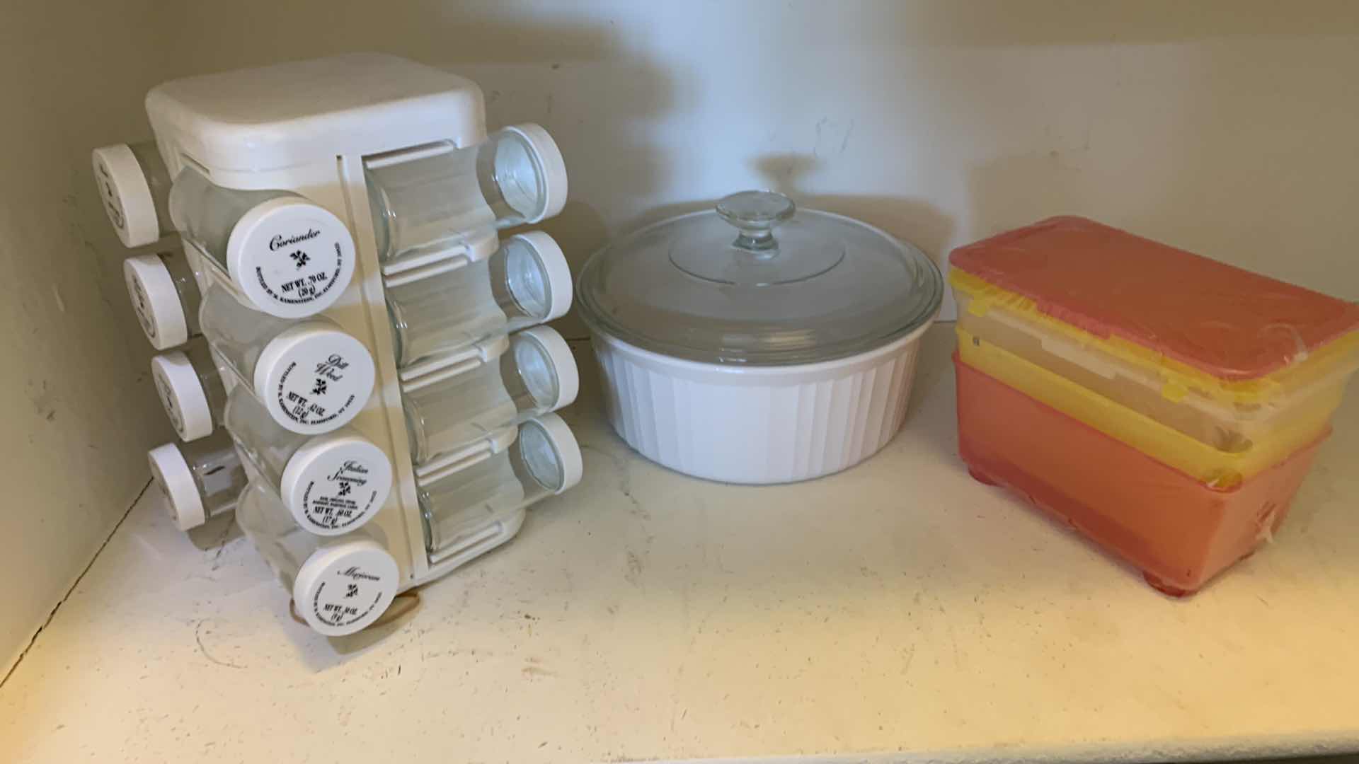 Photo 1 of VINTAGE CORNINGWARE FRENCH WHITE 2.5 QUART CASSEROLE DISH, SPICE RACK, AND CONTAINERS