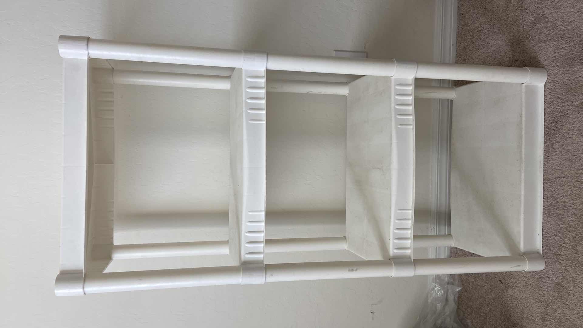 Photo 1 of FOUR TIER PLASTIC SHELF