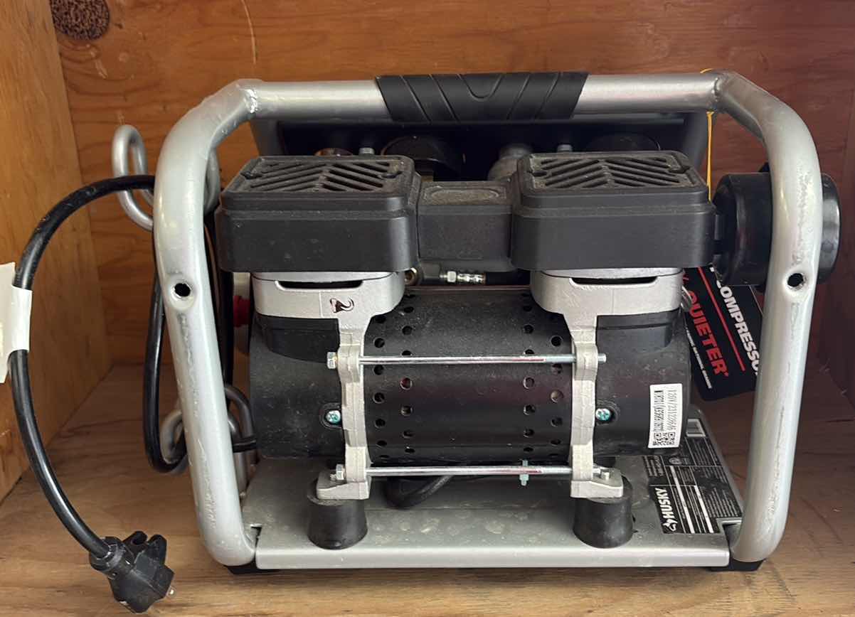 Photo 1 of HUSKY 2-GALLON PORTABLE ELECTRIC SILENT AIR COMPRESSOR MODEL 3300113