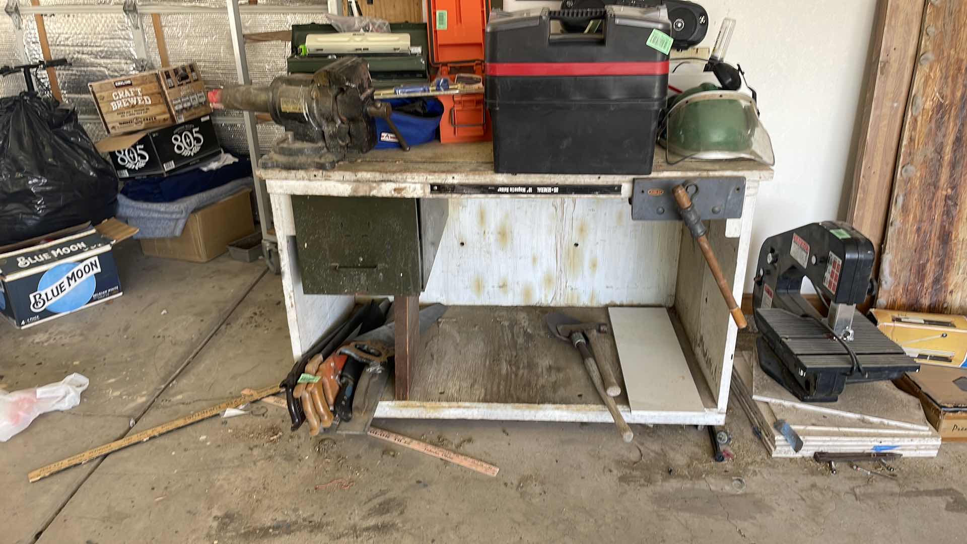 Photo 2 of BENCH WITH VICE TOP CONTENTS AND SAWS NOT INCLUDED 48x 28x 33