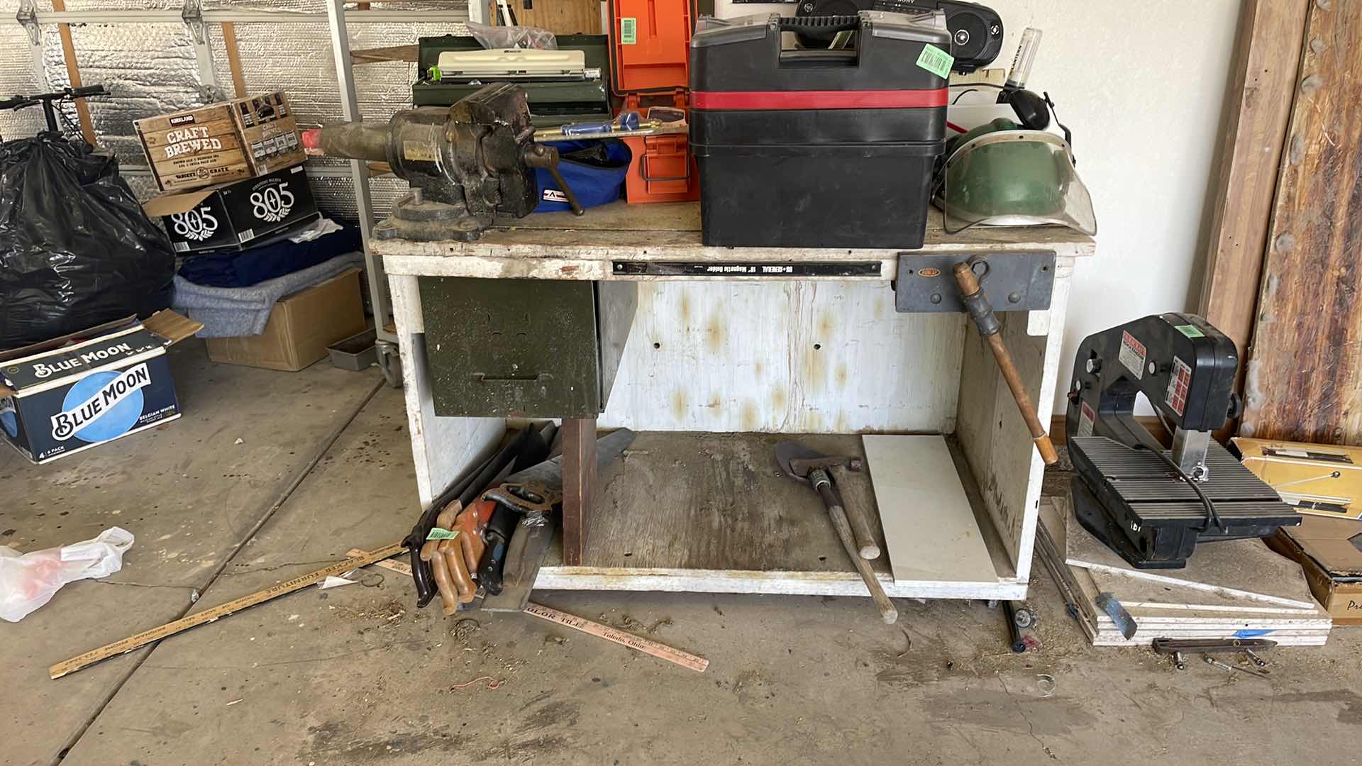 Photo 1 of BENCH WITH VICE TOP CONTENTS AND SAWS NOT INCLUDED 48x 28x 33