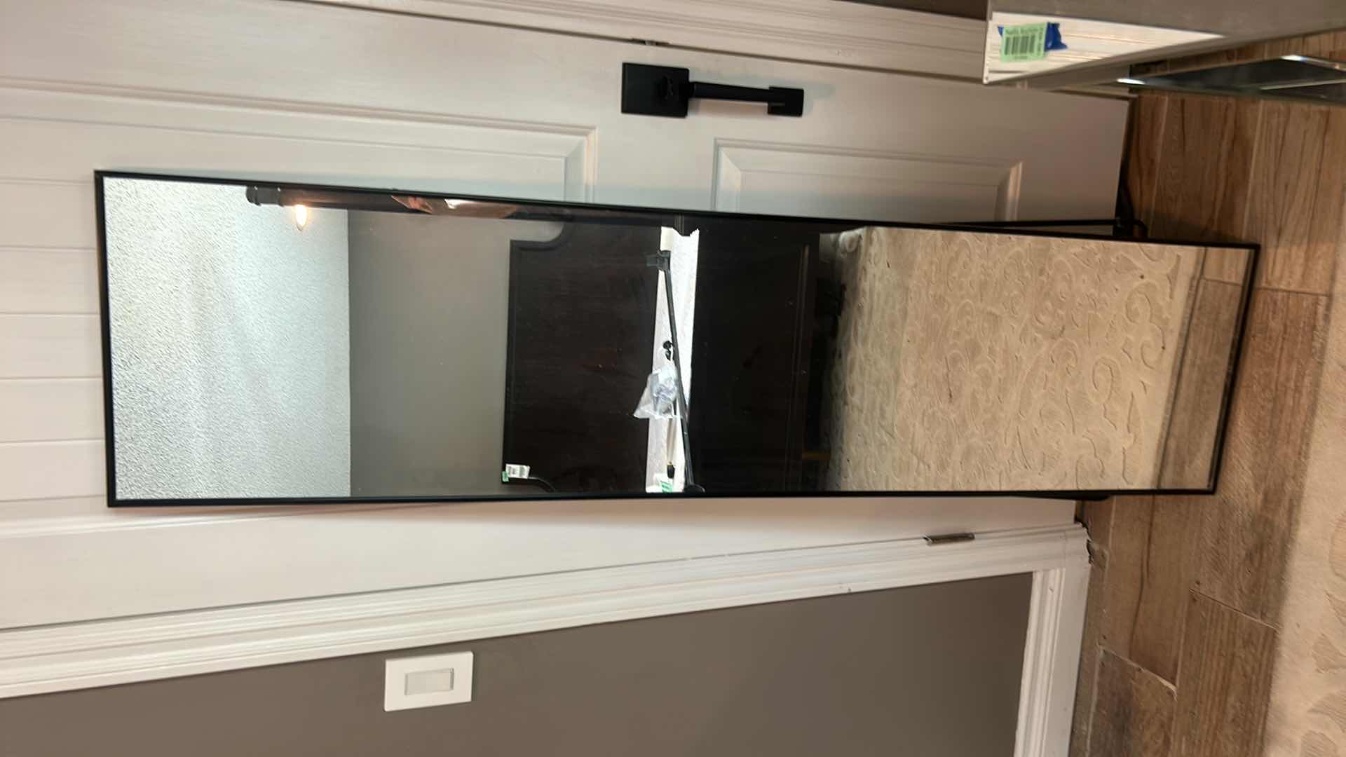 Photo 3 of A MODERN BLACK METAL WARDROBE MIRROR WITH DIMENSIONS OF 40" X H64".