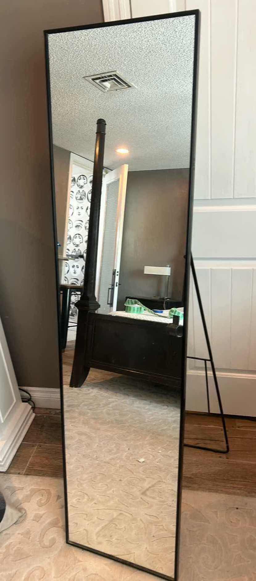 Photo 1 of A MODERN BLACK METAL WARDROBE MIRROR WITH DIMENSIONS OF 40" X H64".