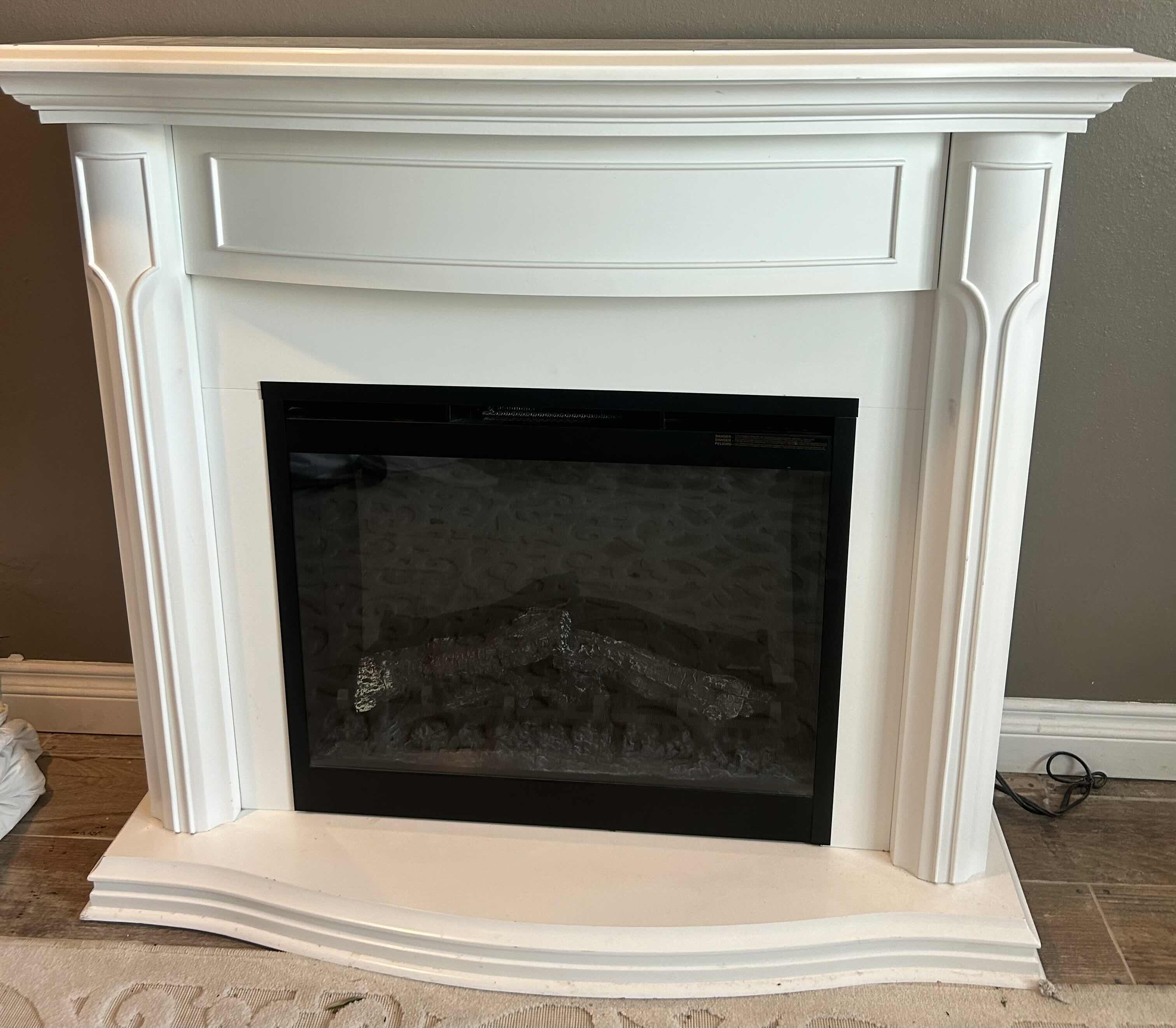 Photo 6 of A WHITE ELECTRICAL FIREPLACE FOR HOME WITH DIMENSIONS OF 47 3/4" X 16 1/2" X H 42".