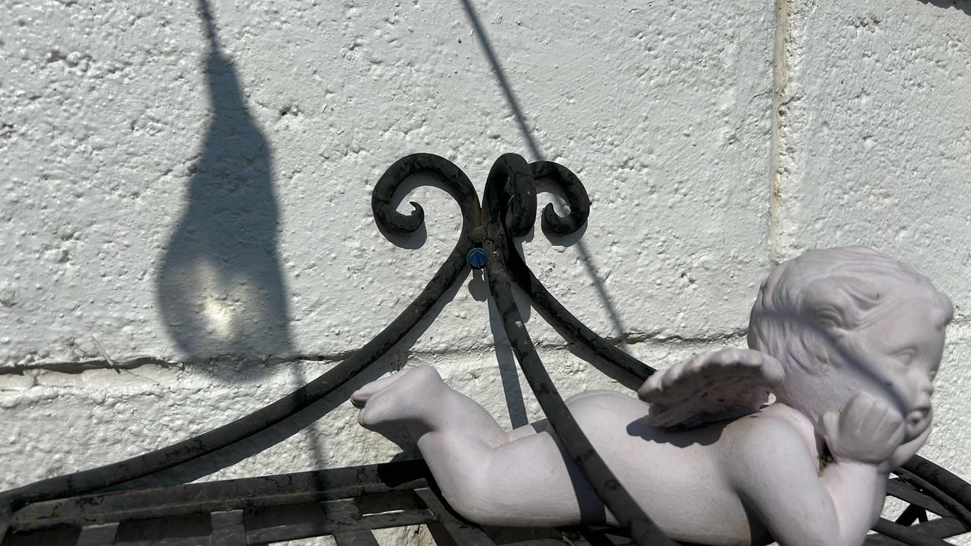 Photo 3 of OUTDOOR DECOR, BLACK METAL, SCULPTURE, H2’ AND CERAMIC ANGEL.