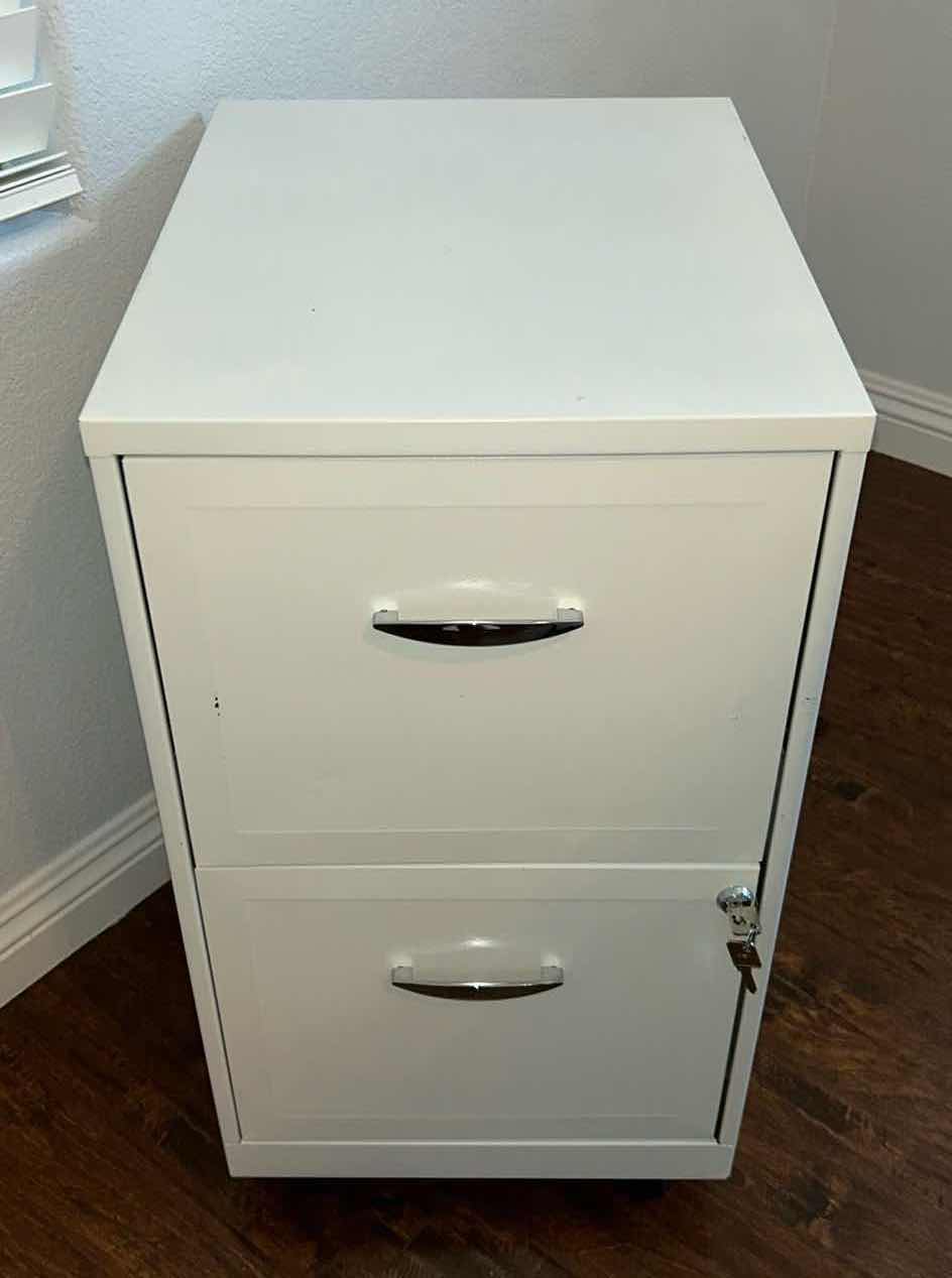 Photo 1 of LOCKING TWO-DOOR METAL FILE CABINET ON WHEELS WITH KEY. 14 1/4" X 18" X H 27"