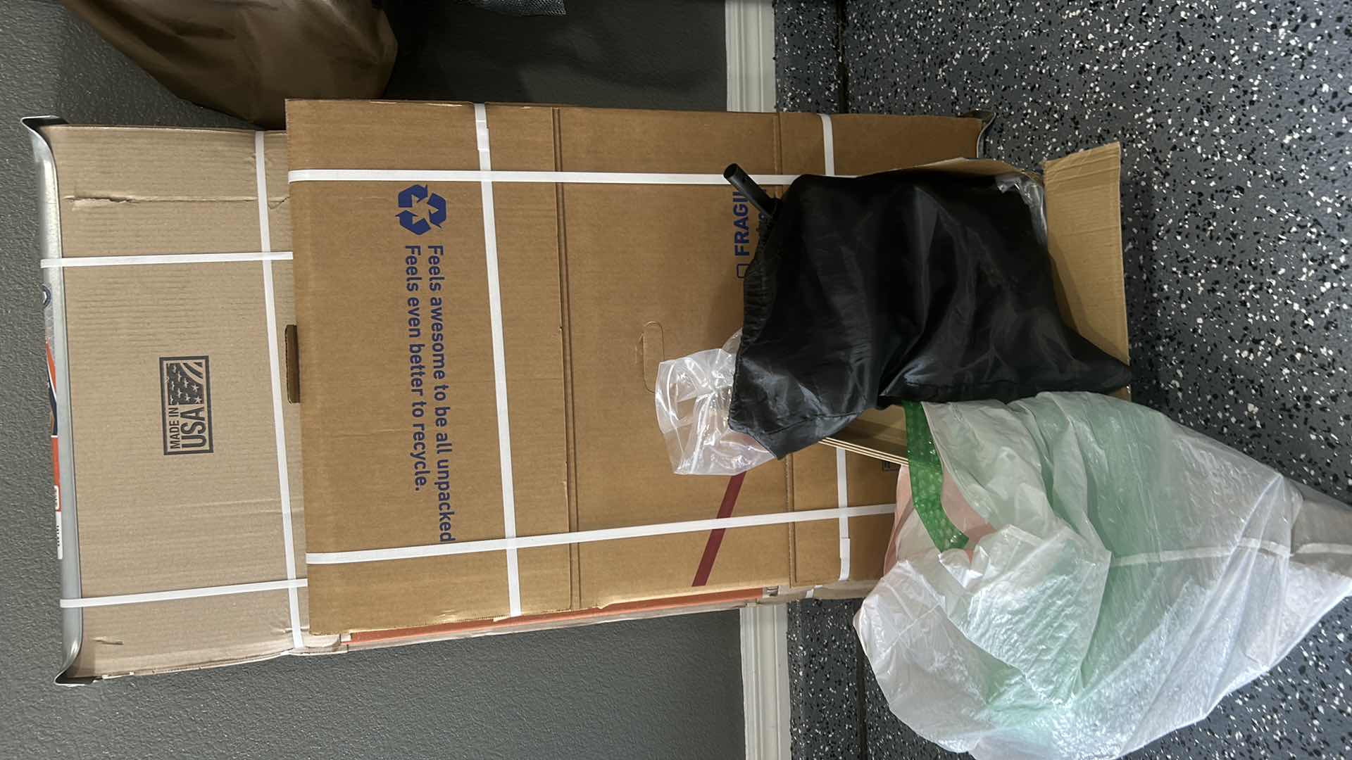 Photo 1 of MOVING AND PACKING MATERIALS, INCLUDING TWO TALL WARDROBE BOXES, GLOVES, AND ACCESSORIES.