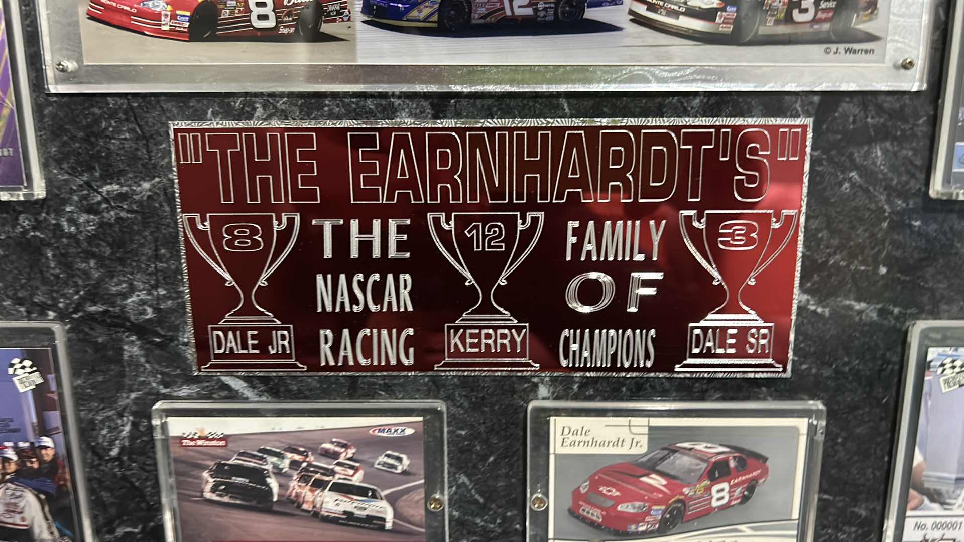 Photo 2 of DALE EARNHARDT COLLECTIBLE MEMORABILIA, SPORTS CARDS, AND MORE. 18“ x H16“