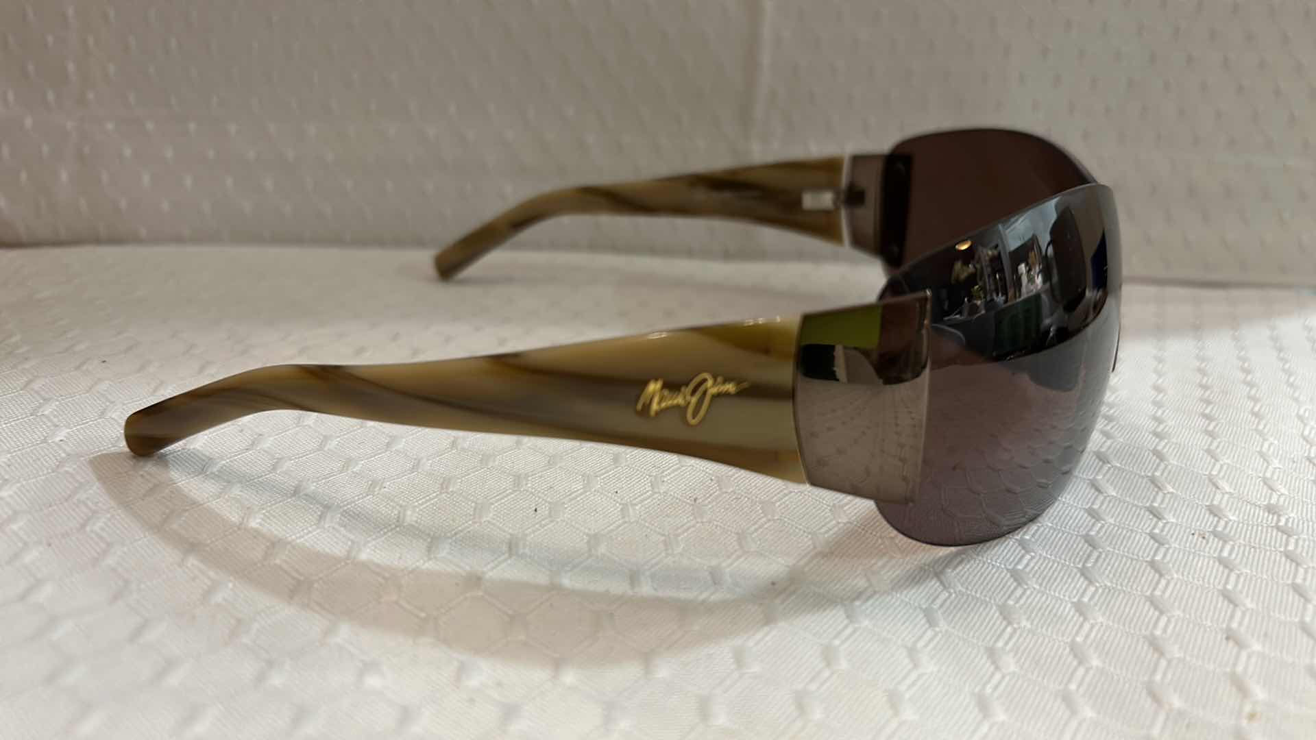 Photo 2 of MAUI JIM SUNGLASSES.