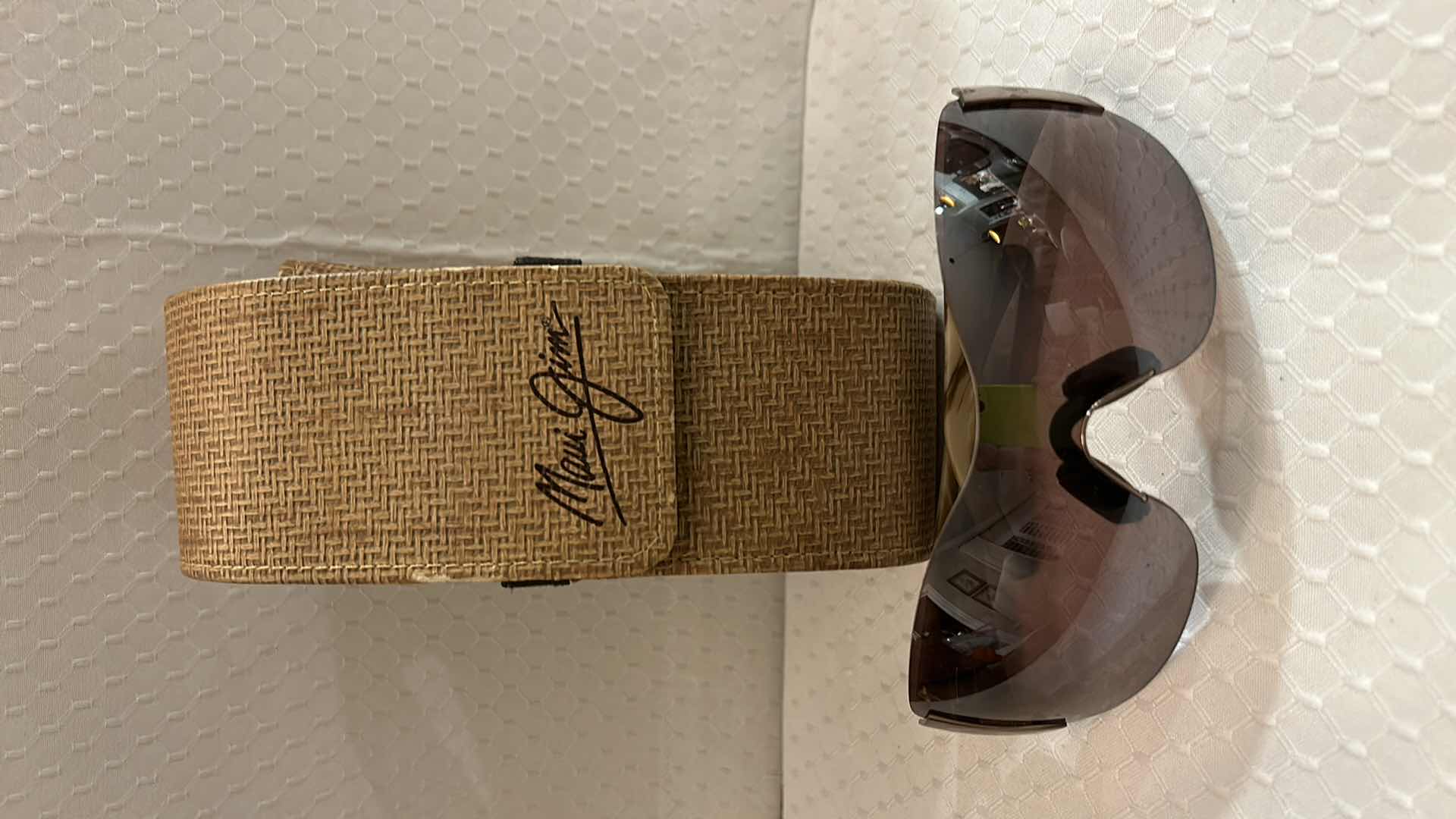 Photo 1 of MAUI JIM SUNGLASSES.