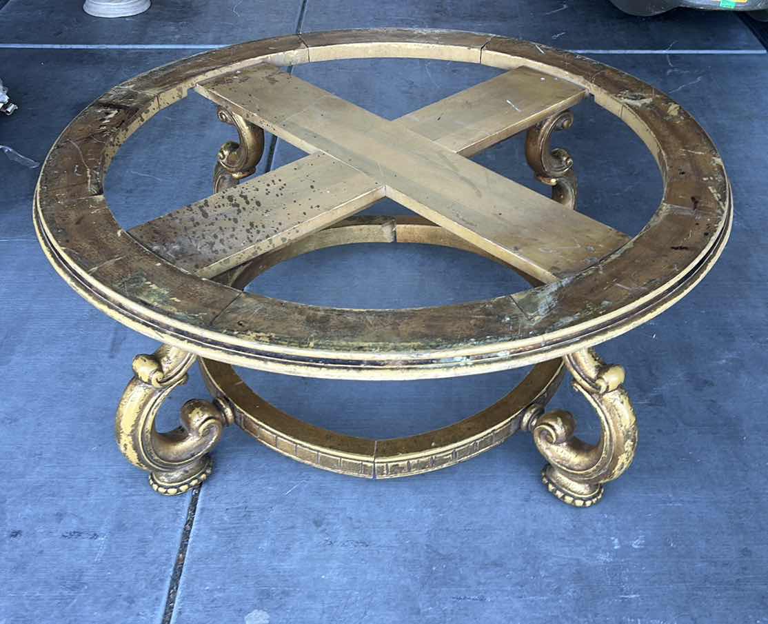 Photo 1 of HOME FURNISHINGS - VINTAGE ORNATE GOLD COFFEE TABLE WITHOUT ROUND GLASS OR MIRROR 41 1?2” X H17”.