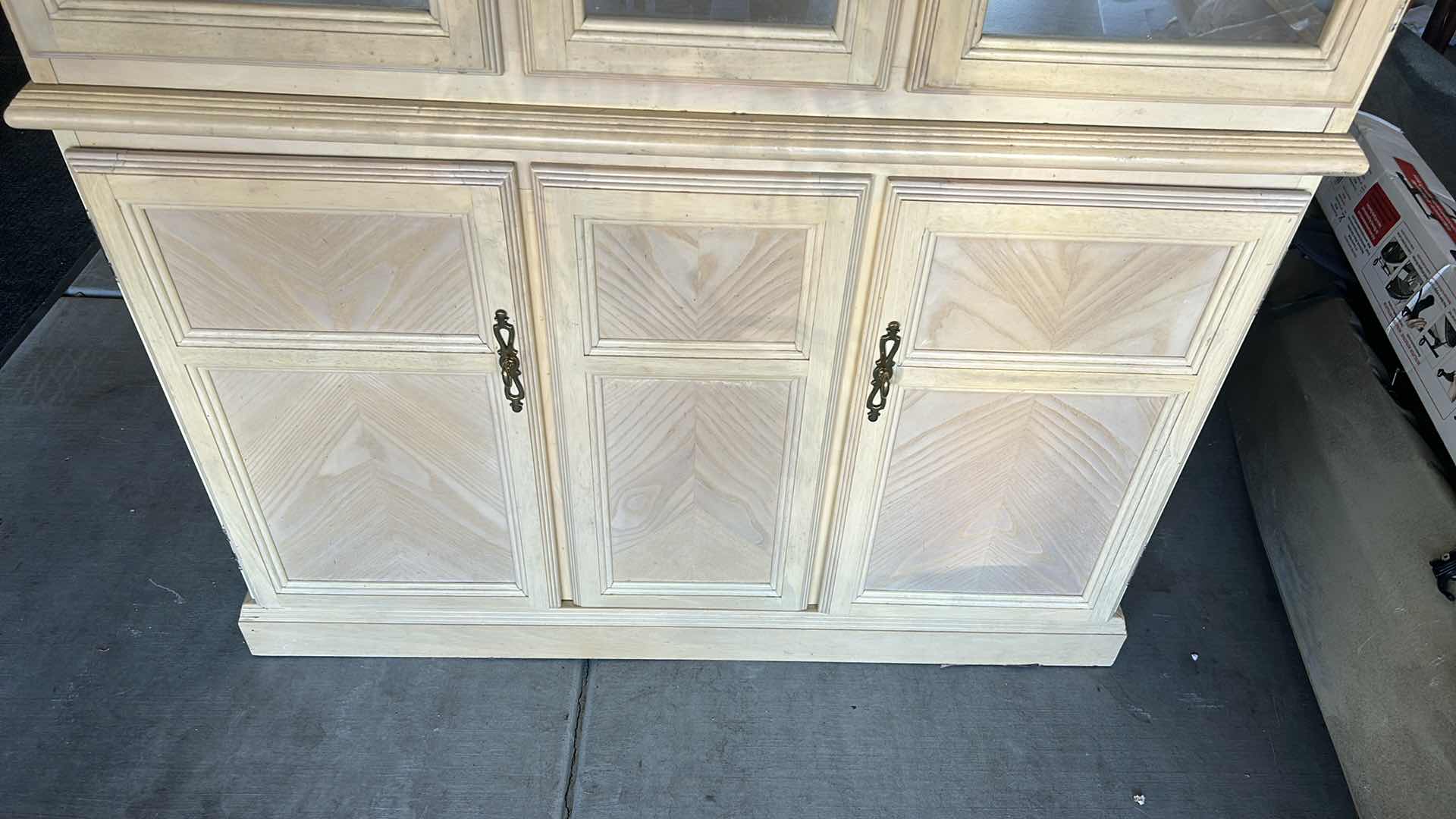 Photo 3 of HOME FURNISHINGS - LIGHT WOOD CURIO/CHINA CABINET WITH TWO GLASS SHELVES AND TWO DRAWERS. 42” X 15” X 79”.