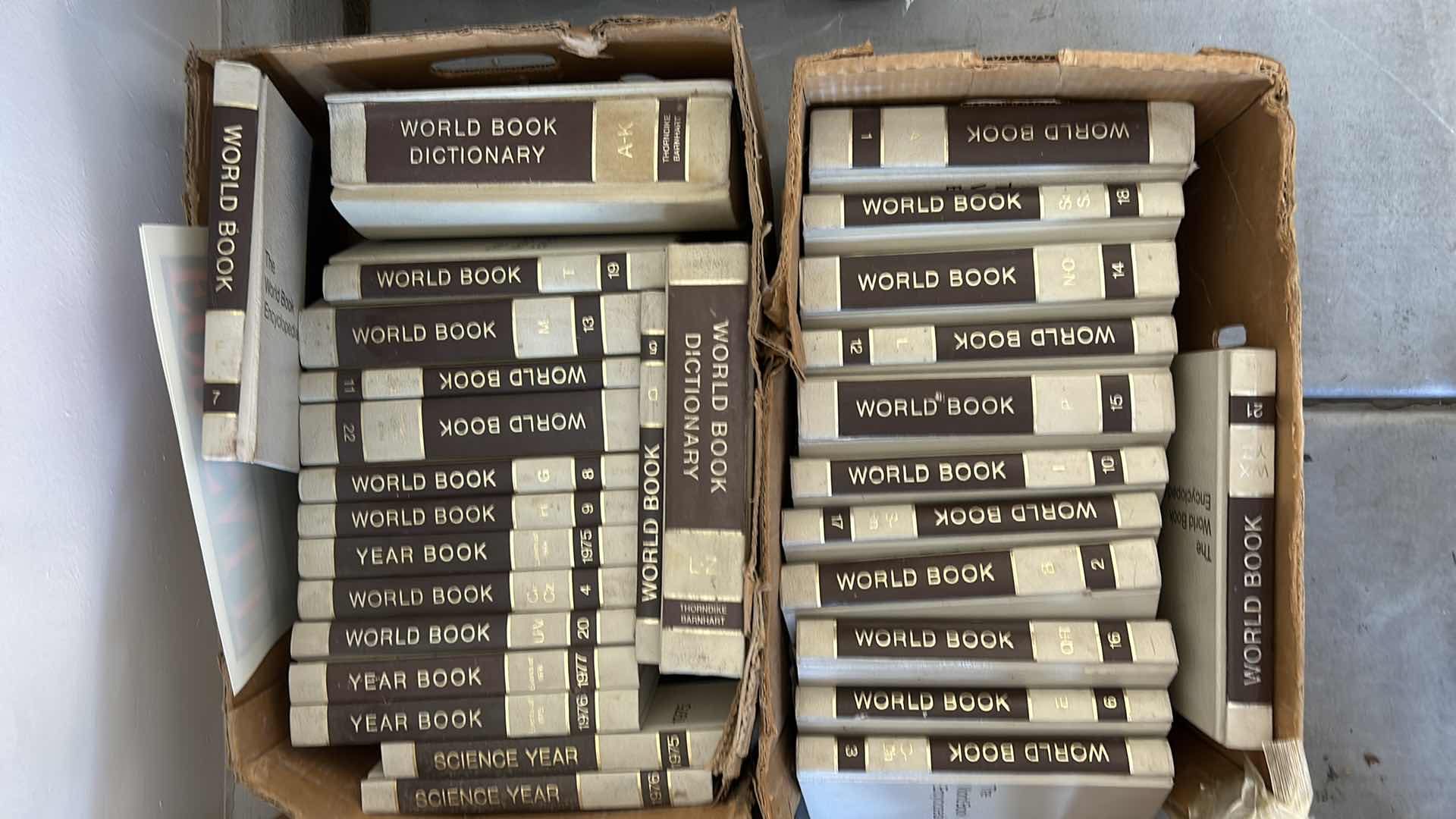 Photo 1 of TWO BOXES, WORLD BOOK, DICTIONARIES, AND ENCYCLOPEDIAS.