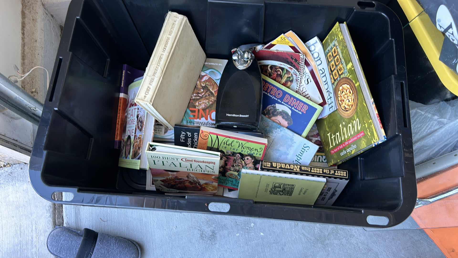 Photo 1 of LARGE TOTE FULL OF RECIPE BOOKS AND ONE CAN OPENER.